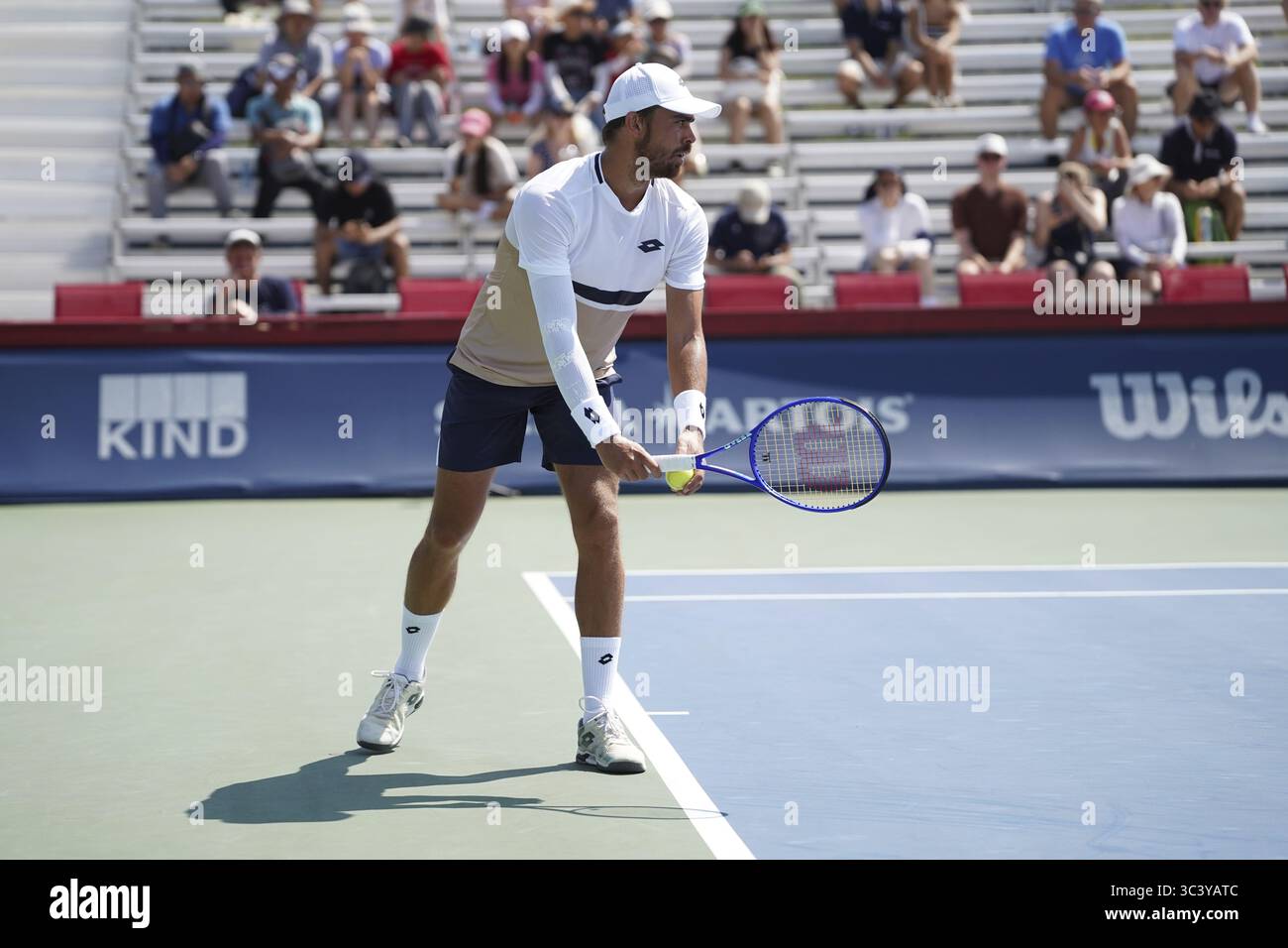 Non Exclusive: Benjamin Bonzi of France serves to Adam Walton of the United States (not pictured) during the Men's Singles first round match on day 2 Stock Photo