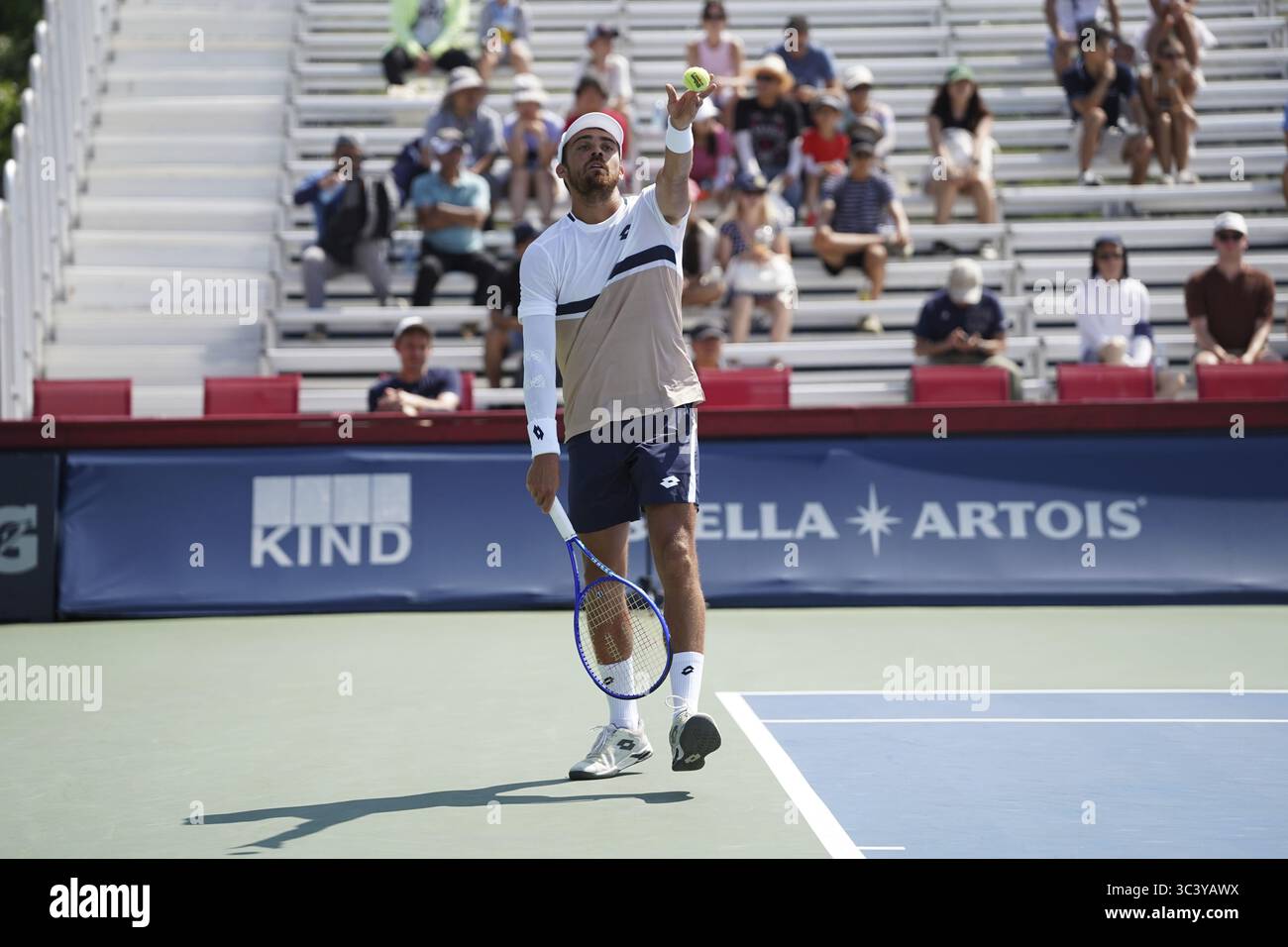 Non Exclusive: Benjamin Bonzi of France serves to Adam Walton of the United States (not pictured) during the Men's Singles first round match on day 2 Stock Photo