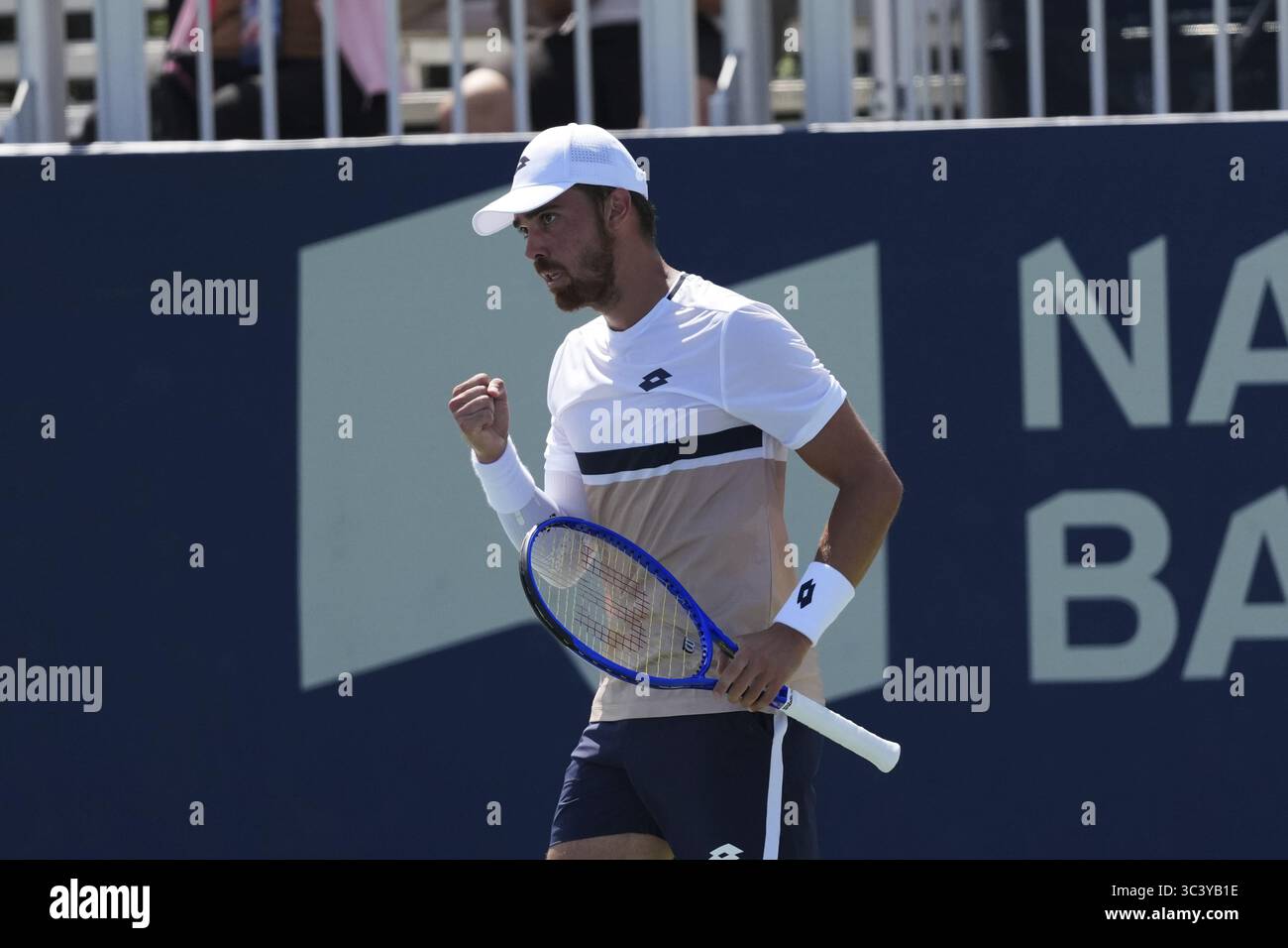 Non Exclusive: Benjamin Bonzi of France celebrates a point against Adam Walton of Australia during the Men's Singles first round match on day 2 of the Stock Photo