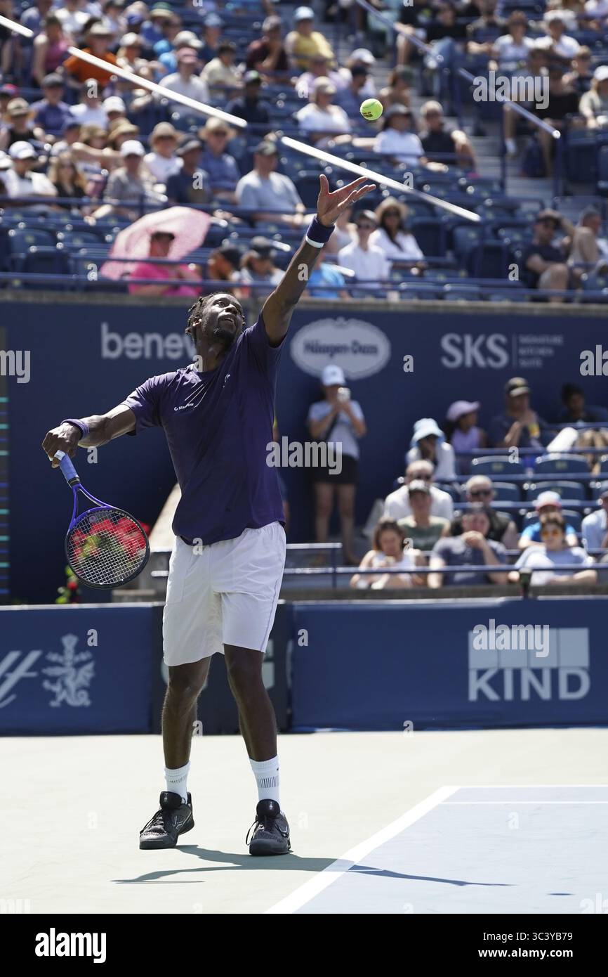 Non Exclusive: Gael Monfils of France serves to Tomas Barrios Vera of Chile (not pictured)  during the Men's Singles first round match on day 2 of the Stock Photo