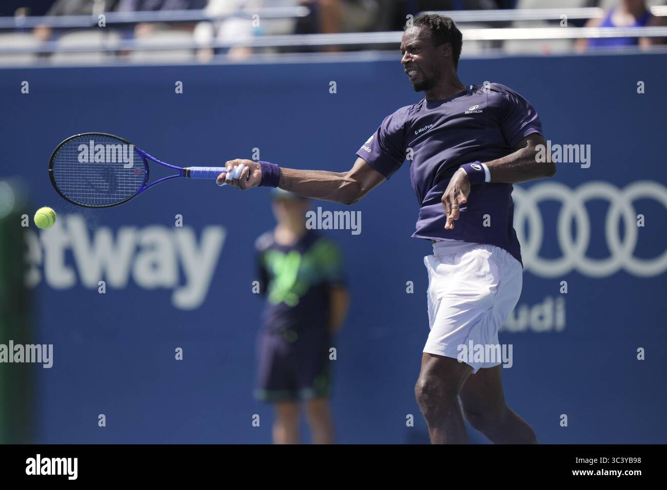 Non Exclusive: Gael Monfils of France plays a forehand against Tomas Barrios Vera of Chile during the Men's Singles first round match on day 2 of the Stock Photo