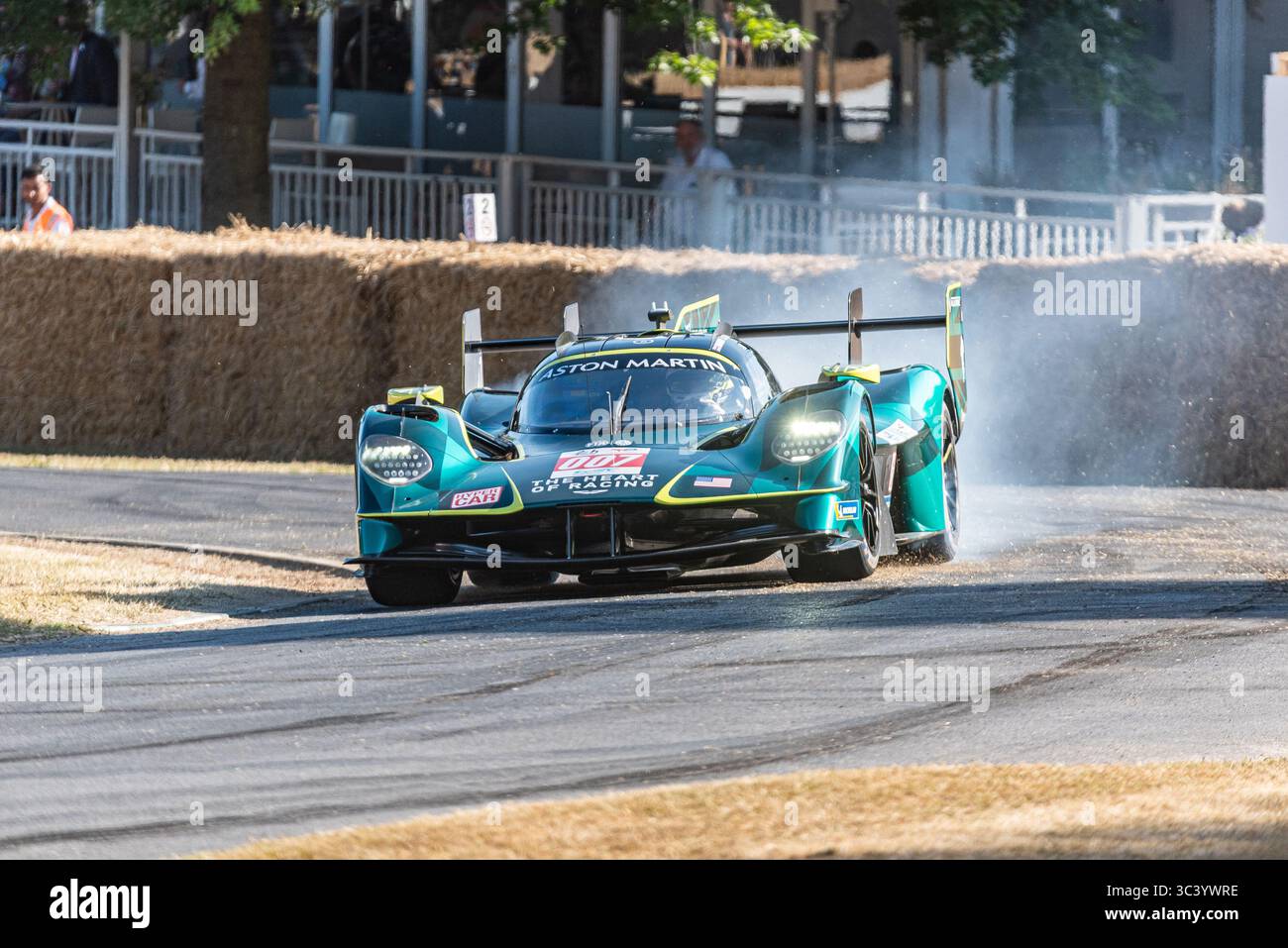 Aston Martin Valkyrie Hypercar 007 supercar driving up the hillclimb track at the Goodwood Festival of Speed 2025 motorsport & motoring event Stock Photo