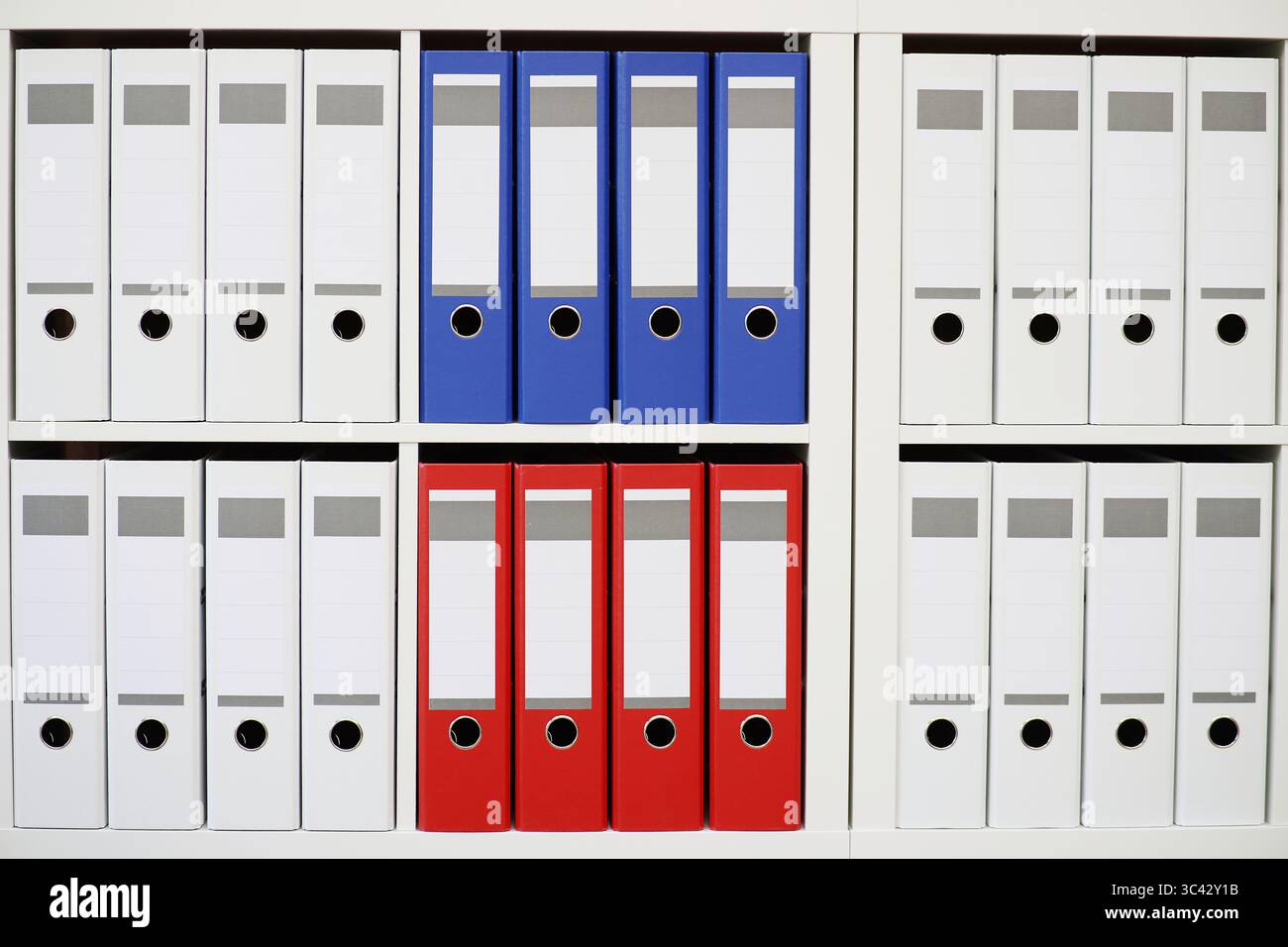 Filing cabinet with white, blue and red file folders Stock Photo - Alamy