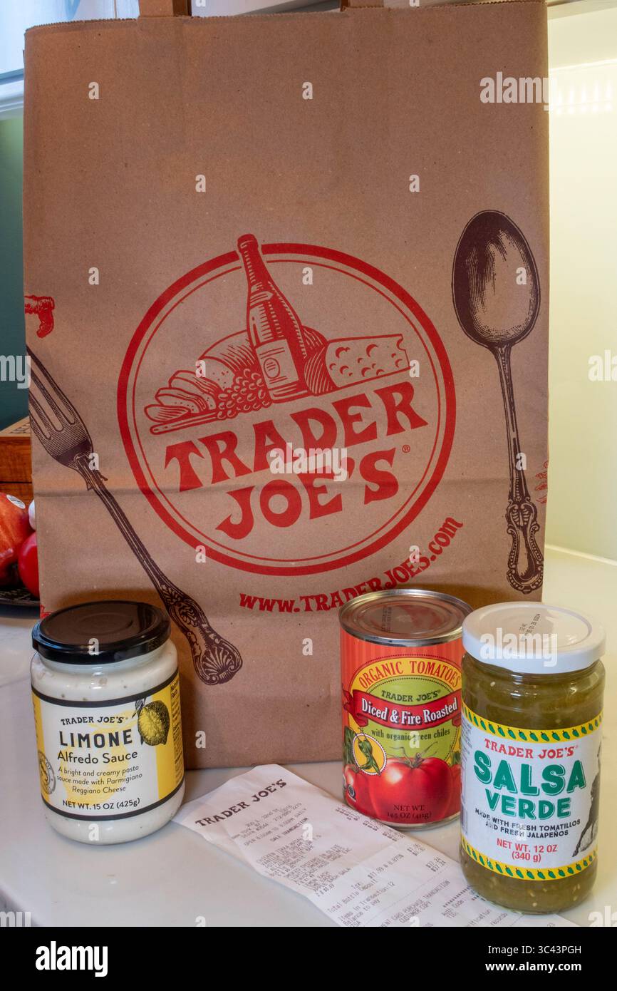 Kitchen counter with store brand products and Trader Joe's shopping bag,  USA  2025 Stock Photo