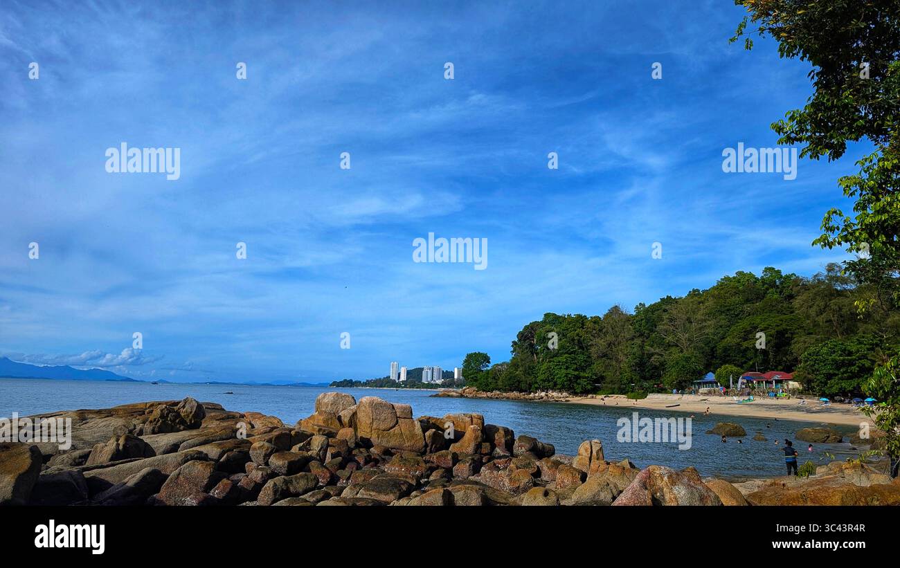 breathtaking sunset photography scene unfolds at Batu Caves Malaysia, where a golden hour sky meets urban tower lights and road night lighting. From - Smartphone Captured Stock Image