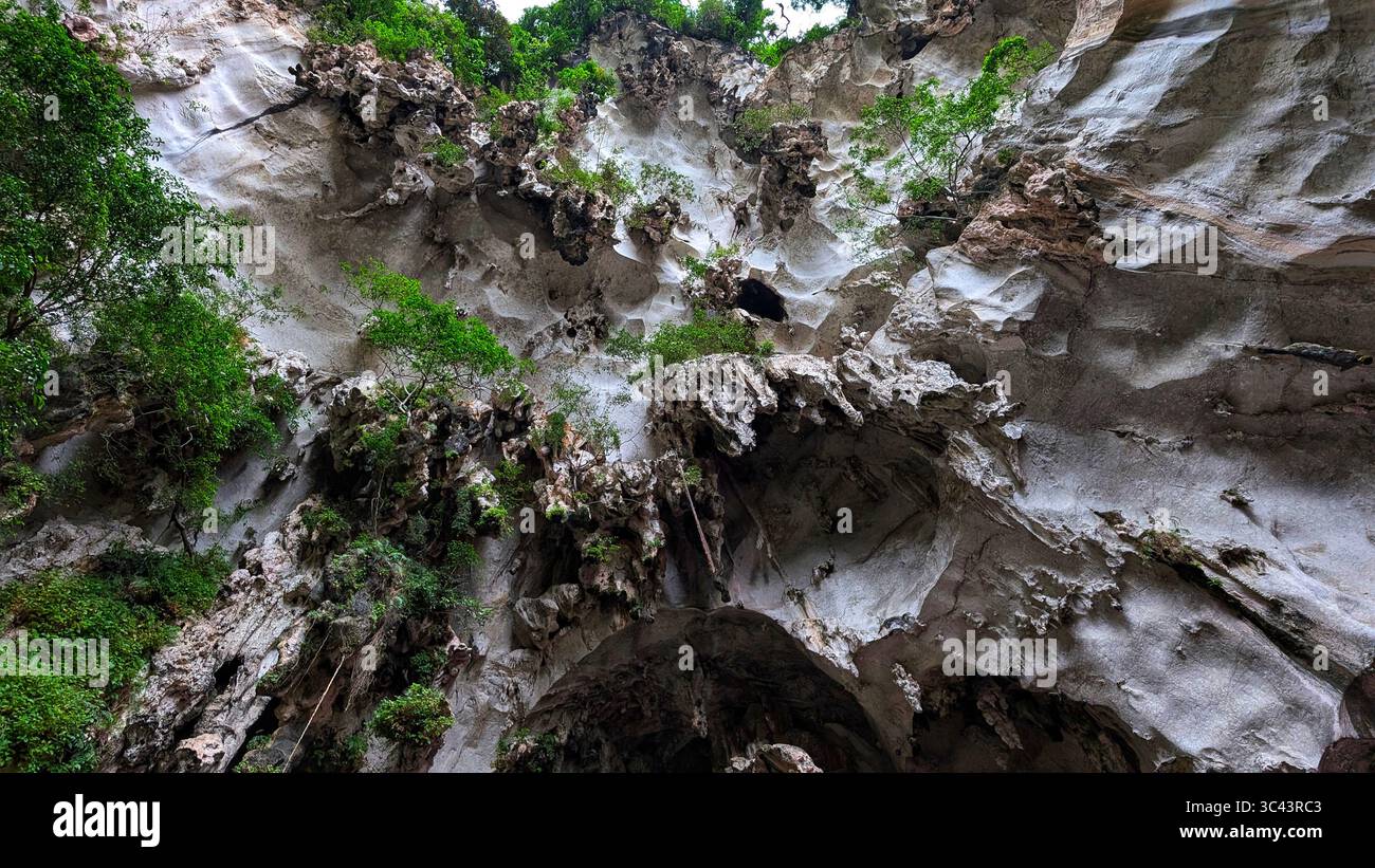 breathtaking sunset photography scene unfolds at Batu Caves Malaysia, where a golden hour sky meets urban tower lights and road night lighting. From - Smartphone Captured Stock Image