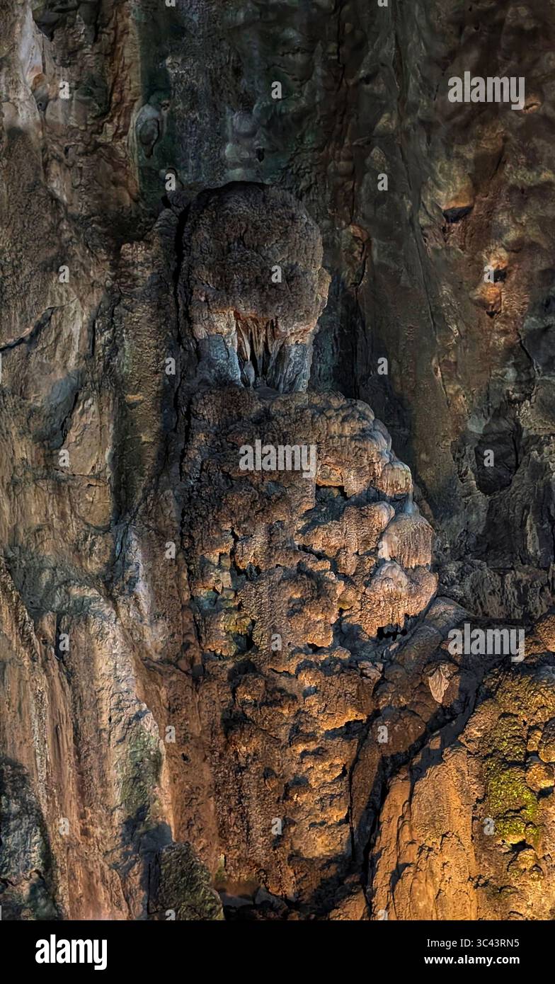 breathtaking sunset photography scene unfolds at Batu Caves Malaysia, where a golden hour sky meets urban tower lights and road night lighting. From - Smartphone Captured Stock Image