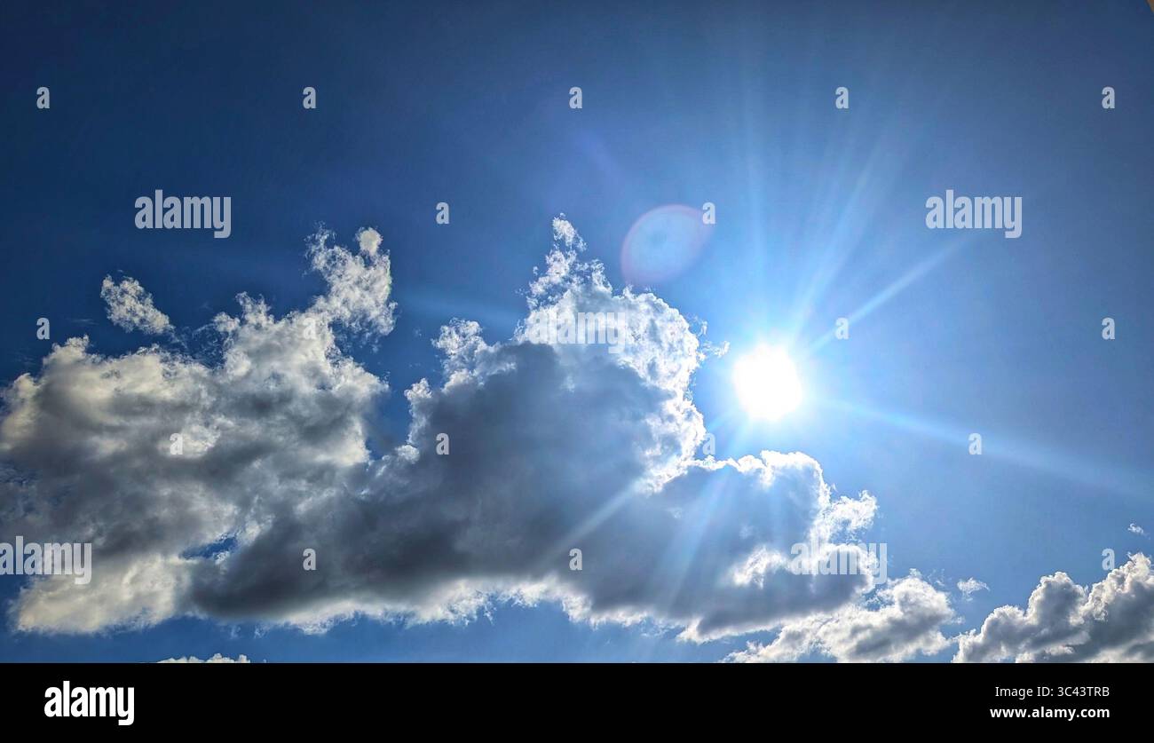breathtaking sunset photography scene unfolds at Batu Caves Malaysia, where a golden hour sky meets urban tower lights and road night lighting. From - Smartphone Captured Stock Image