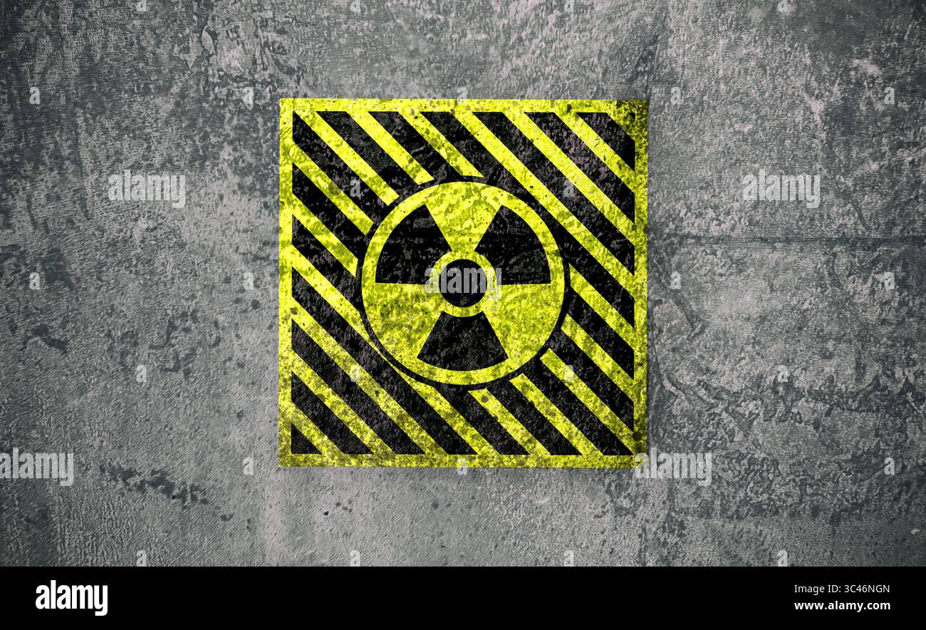 Radioactive sign on grey textured surface. Radiological pollution Stock Photo