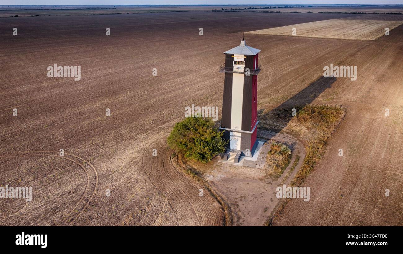 Aerial view of the Khablovskyi Rear Lighthouse, its stark black, white ...