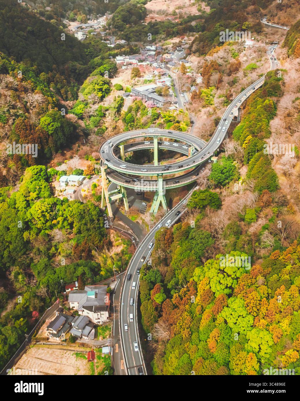 Aerial view of the Kawazu Nanadaru Loop Bridge spiraling amidst a ...