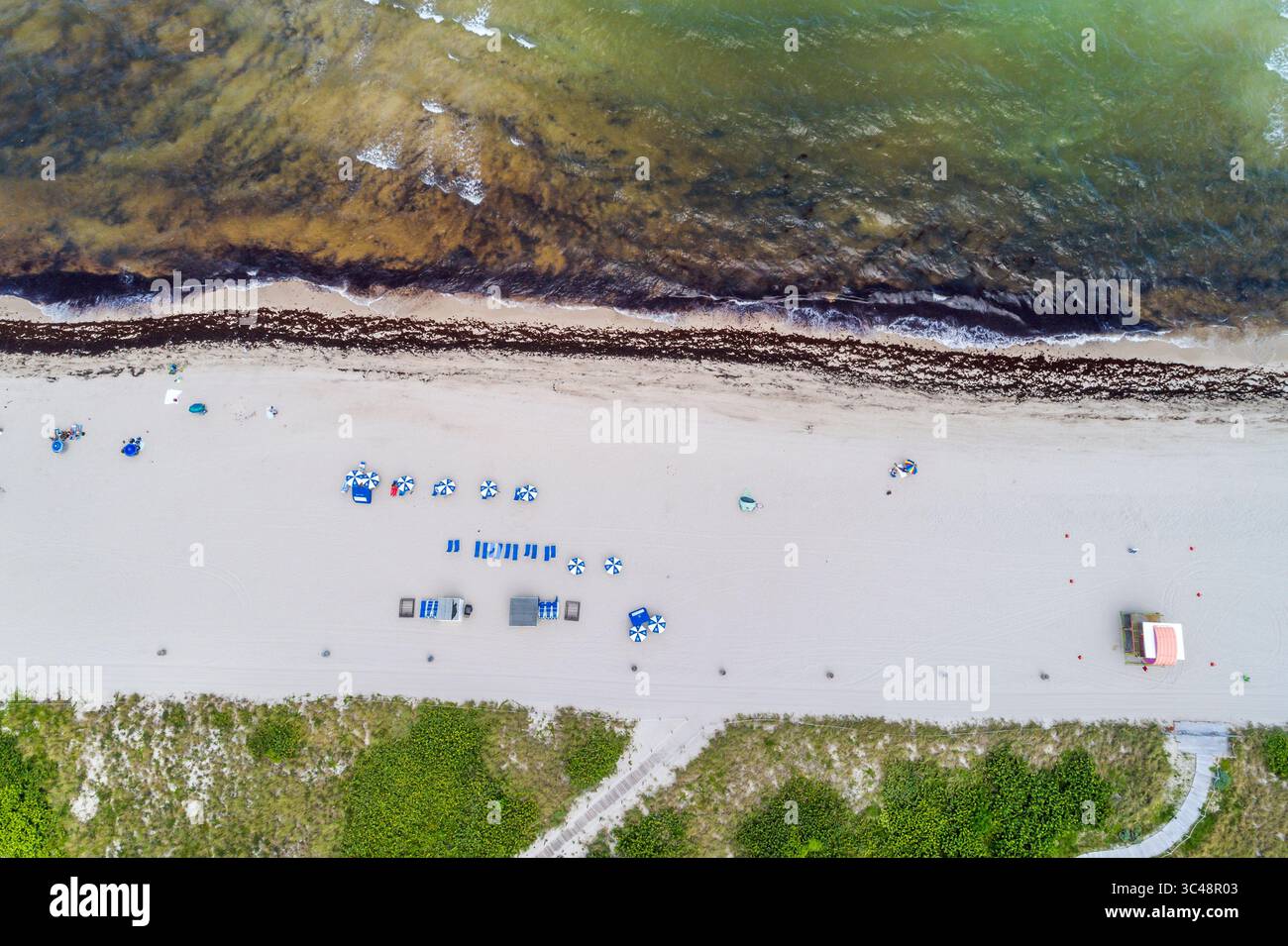 Many personal shade structures set up hi-res stock photography and ...