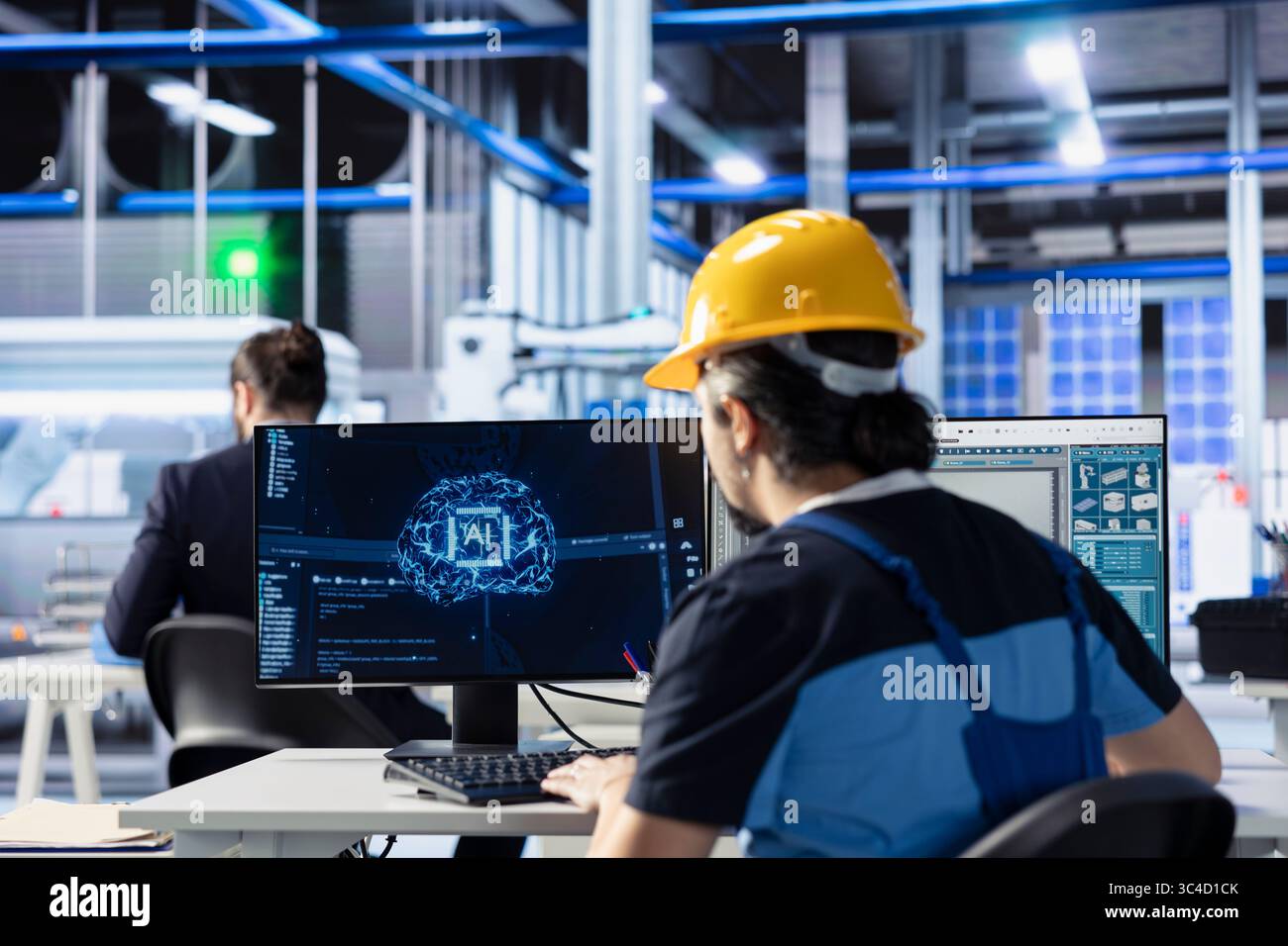 Engineer developing AI diagnostics tool in photovoltaic factory to predict component failures. Solar panels plant technician coding artificial intelligence algorithms to enhance predictive maintenance Stock Photo