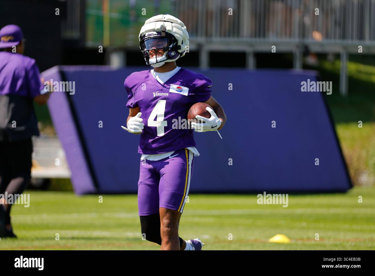 Minnesota Vikings wide receiver Rondale Moore (4) runs drills during the team's NFL football ...