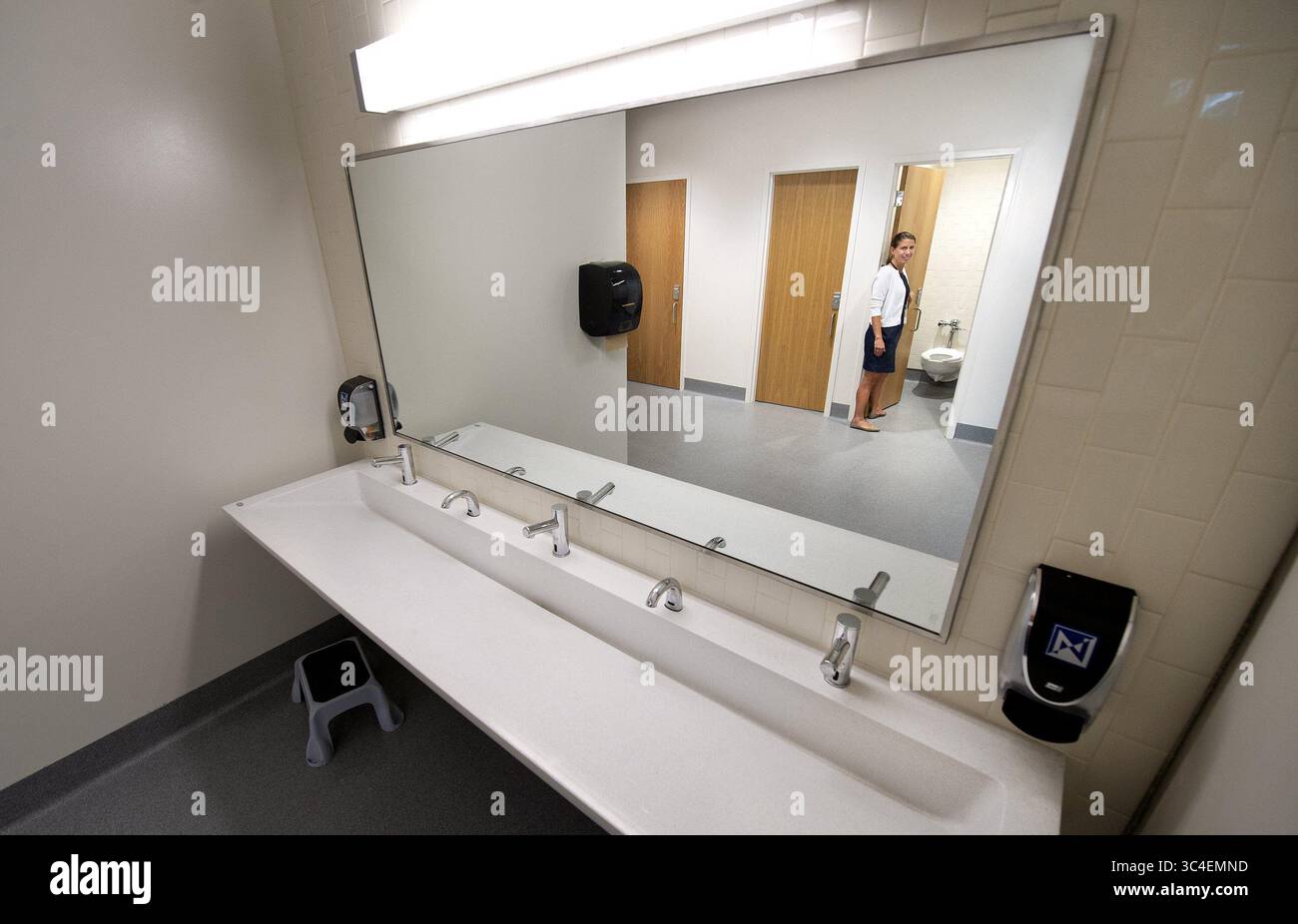 At the new Rising Hill Elementary School, gender neutral student bathrooms  have a common sink area for washing and individual, locking, toilet stalls  that can be used by boys or girls. Principal, image size:1300x926