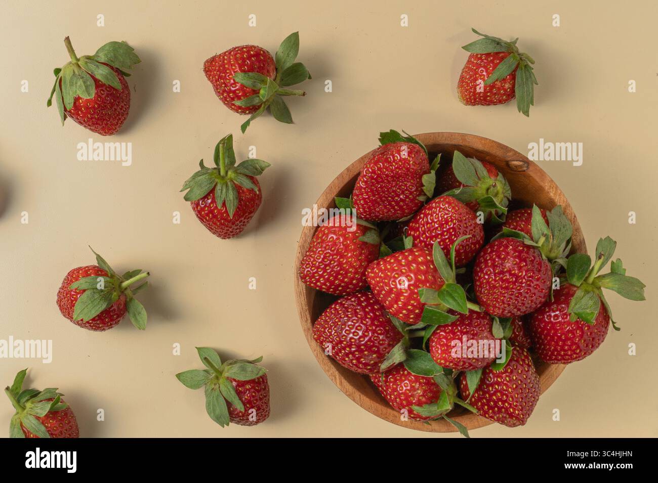 A fresh, ripe strawberry captured in detail, showcasing its vibrant red ...