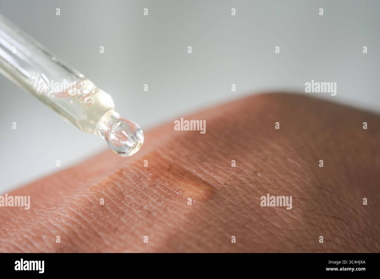 Serum drop falling on hi-res stock photography and images - Alamy