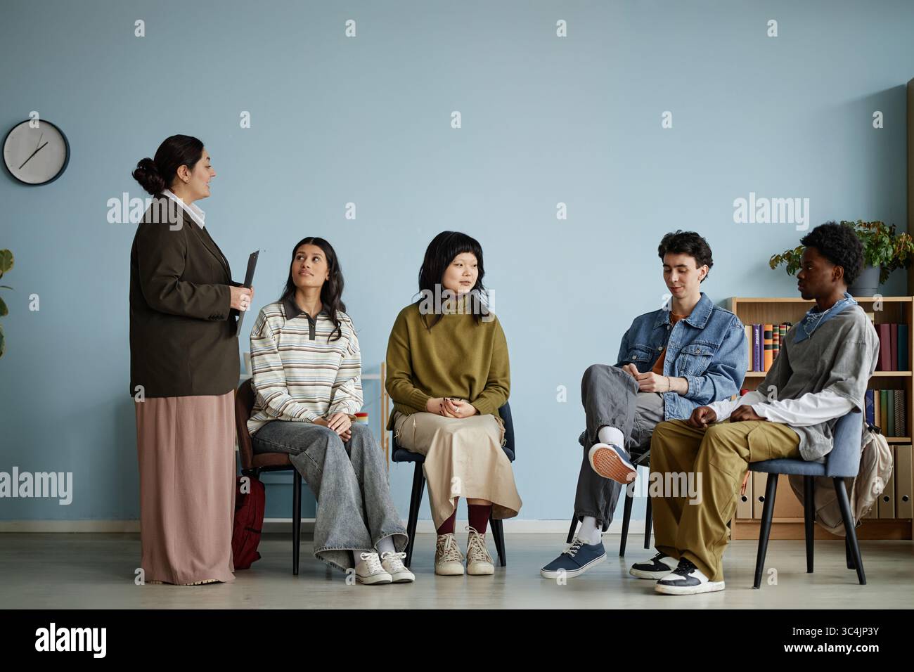 Diverse teenager and counselor hi-res stock photography and images - Alamy
