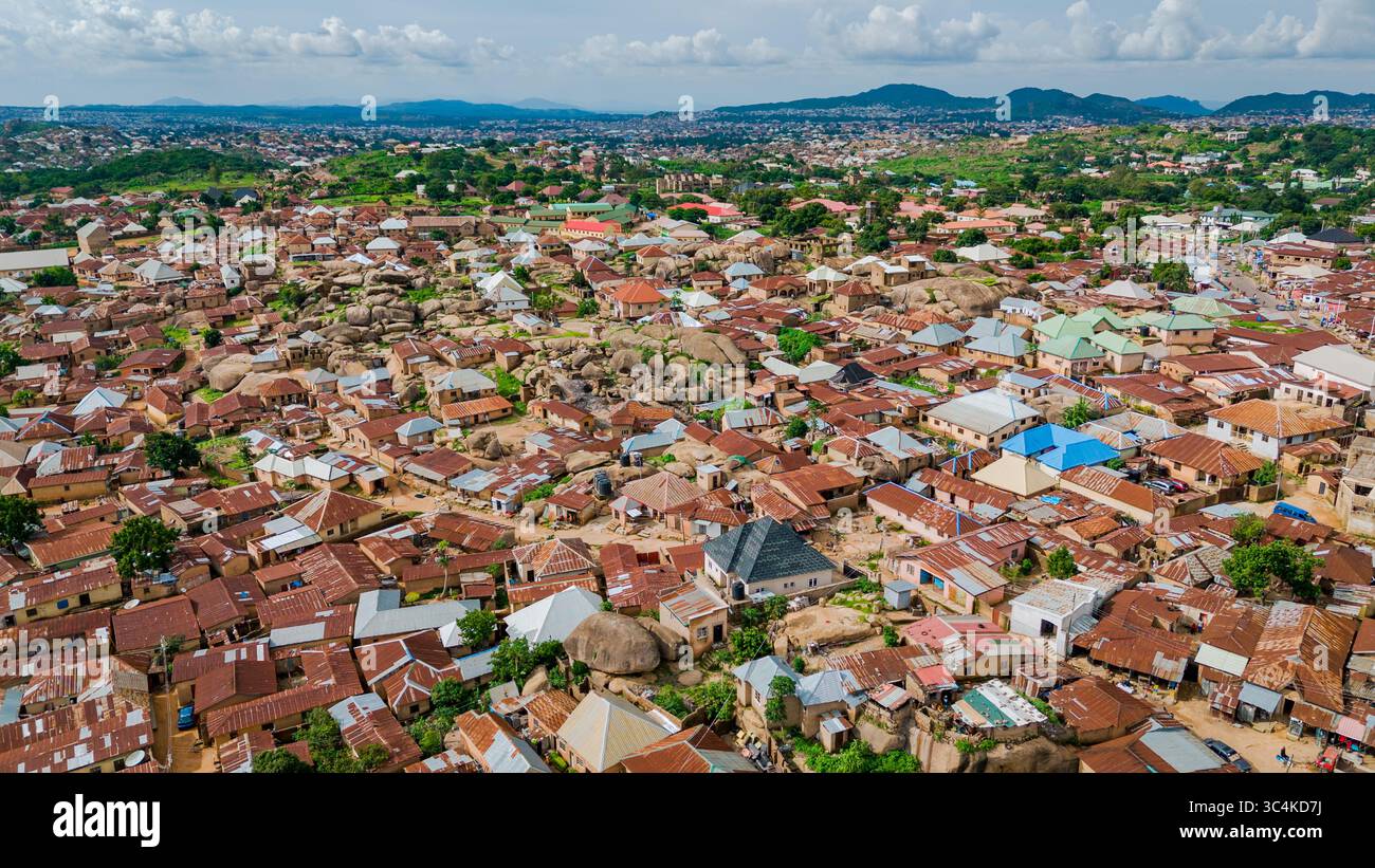 Aerial view of a sprawling city with tightly packed buildings creating ...