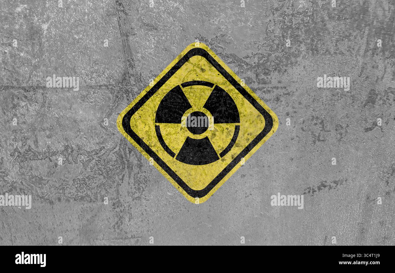 Radioactive sign on grey textured surface. Radiological pollution Stock Photo