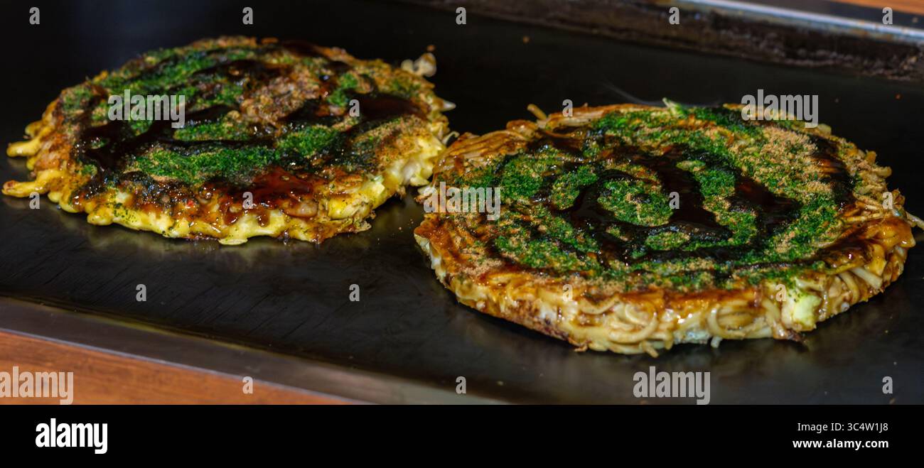 Two Delicious Okonomiyaki Savory Japanese Grilled Pancake Stock Photo