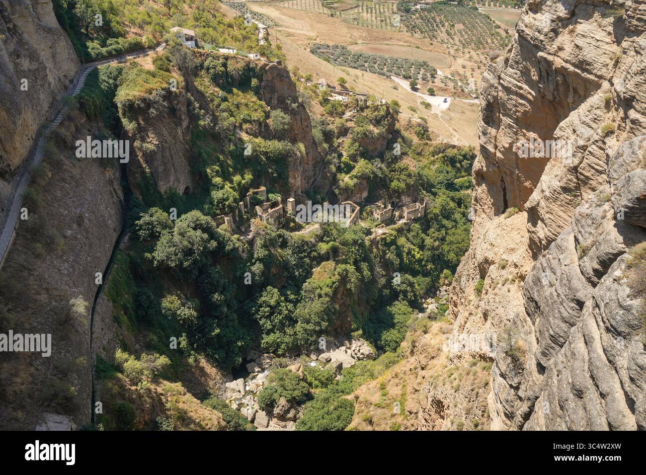 George In Ronda Spain Rond Spain. The deep Tajo gorge of Ronda, that splits the spanish ...