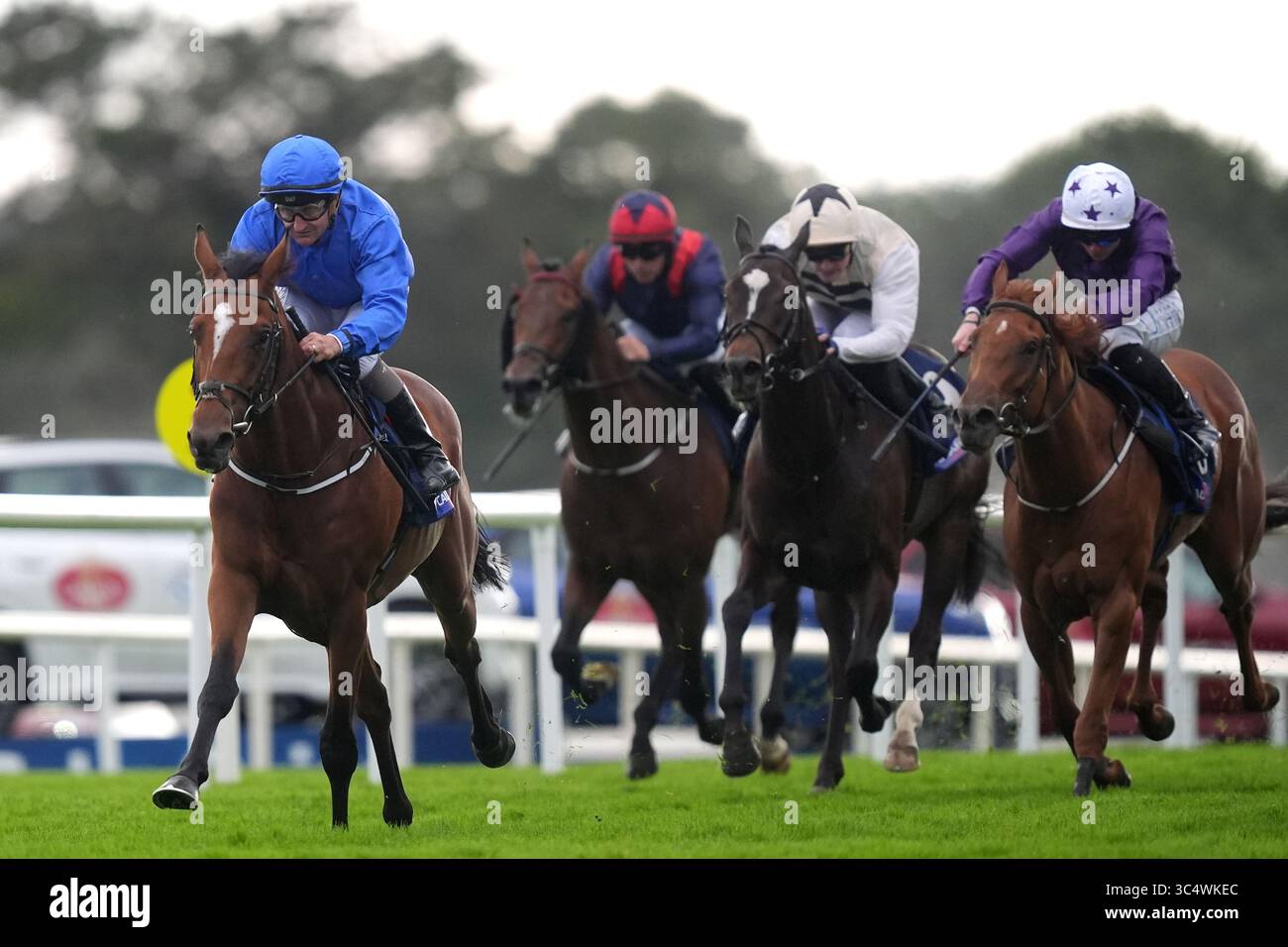 Collecting Coin ridden by Shane Foley (left) on their way to winning ...