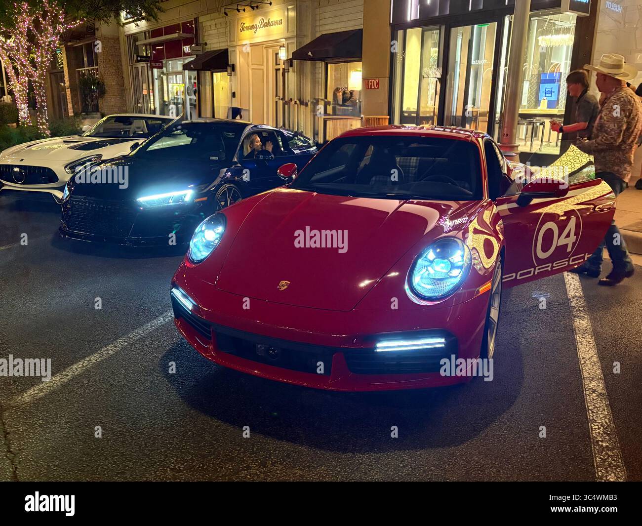 Porsche 911 Carrera next to Audi R8 4S and Mercedes AMG GT S - Smartphone Captured Stock Image Porsche 911 Carrera next to Audi R8 4S and Mercedes AMG GT S - Smartphone Captured Stock Image