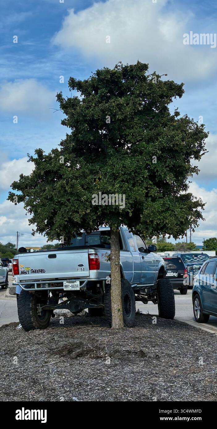 Lifted Ford Ranger Parked Over a Curb - Smartphone Captured Stock Image