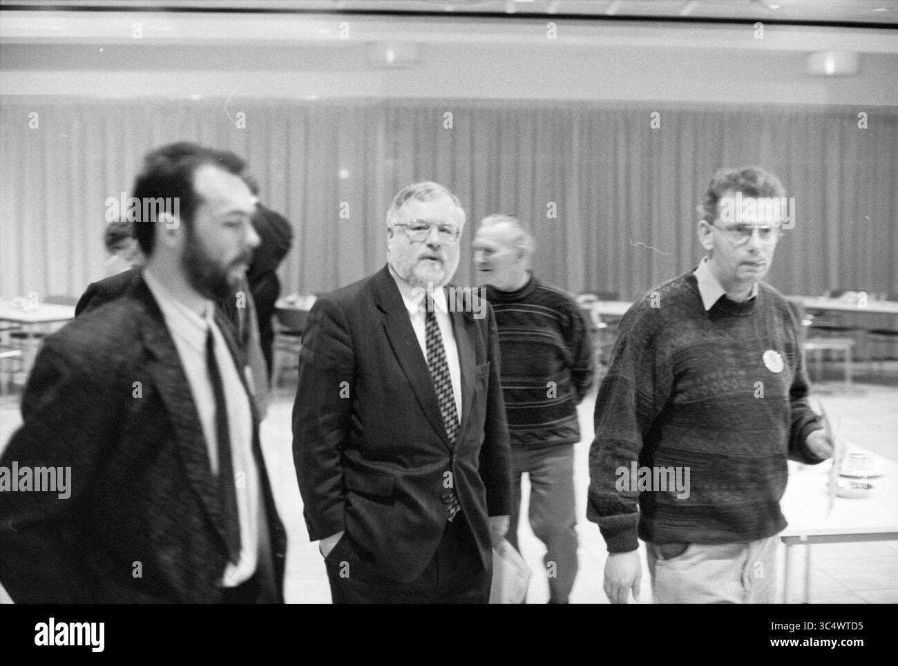 Man in casual wear walking Black and White Stock Photos & Images - Alamy