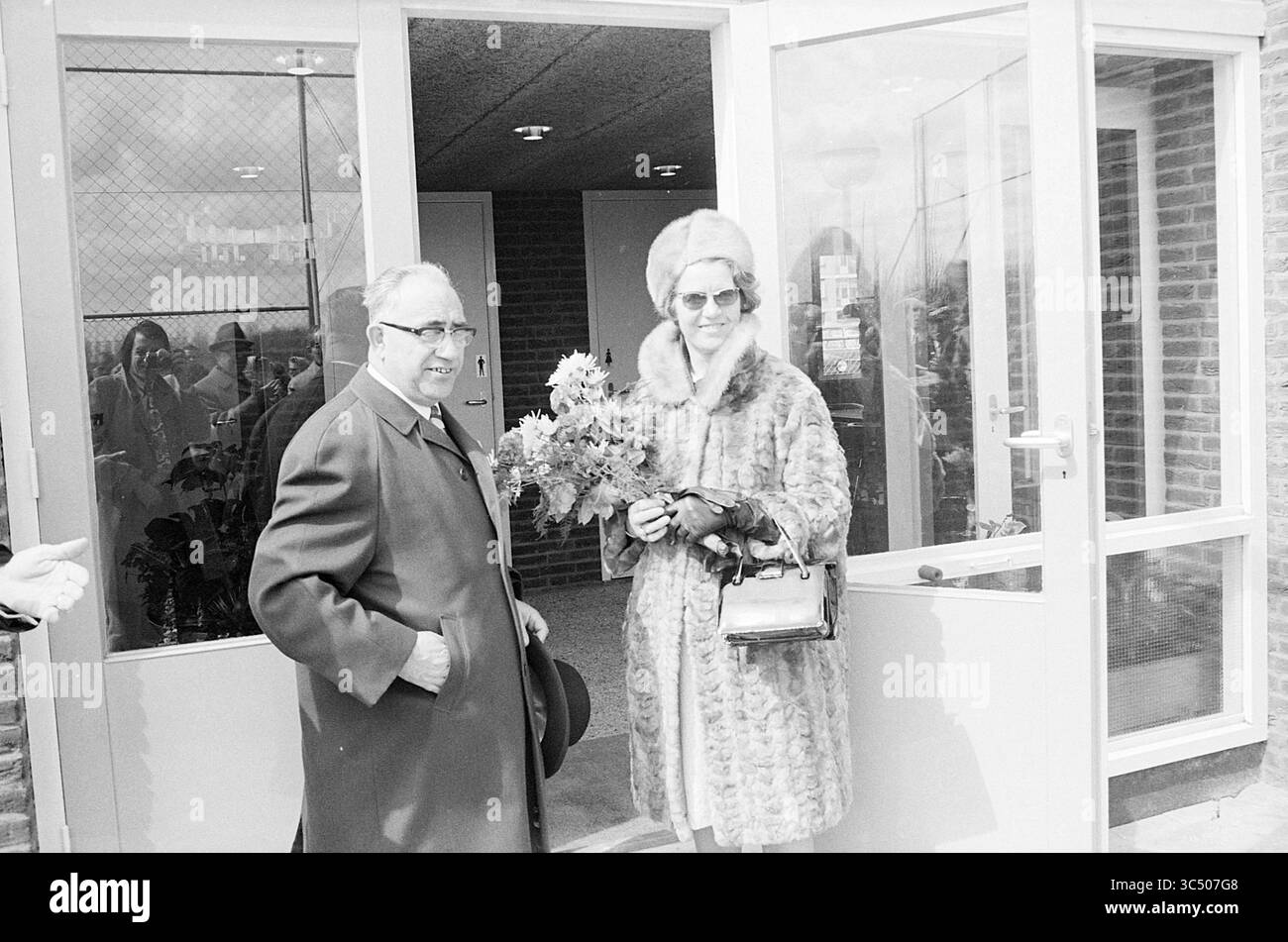Man welcoming guests Black and White Stock Photos & Images - Alamy