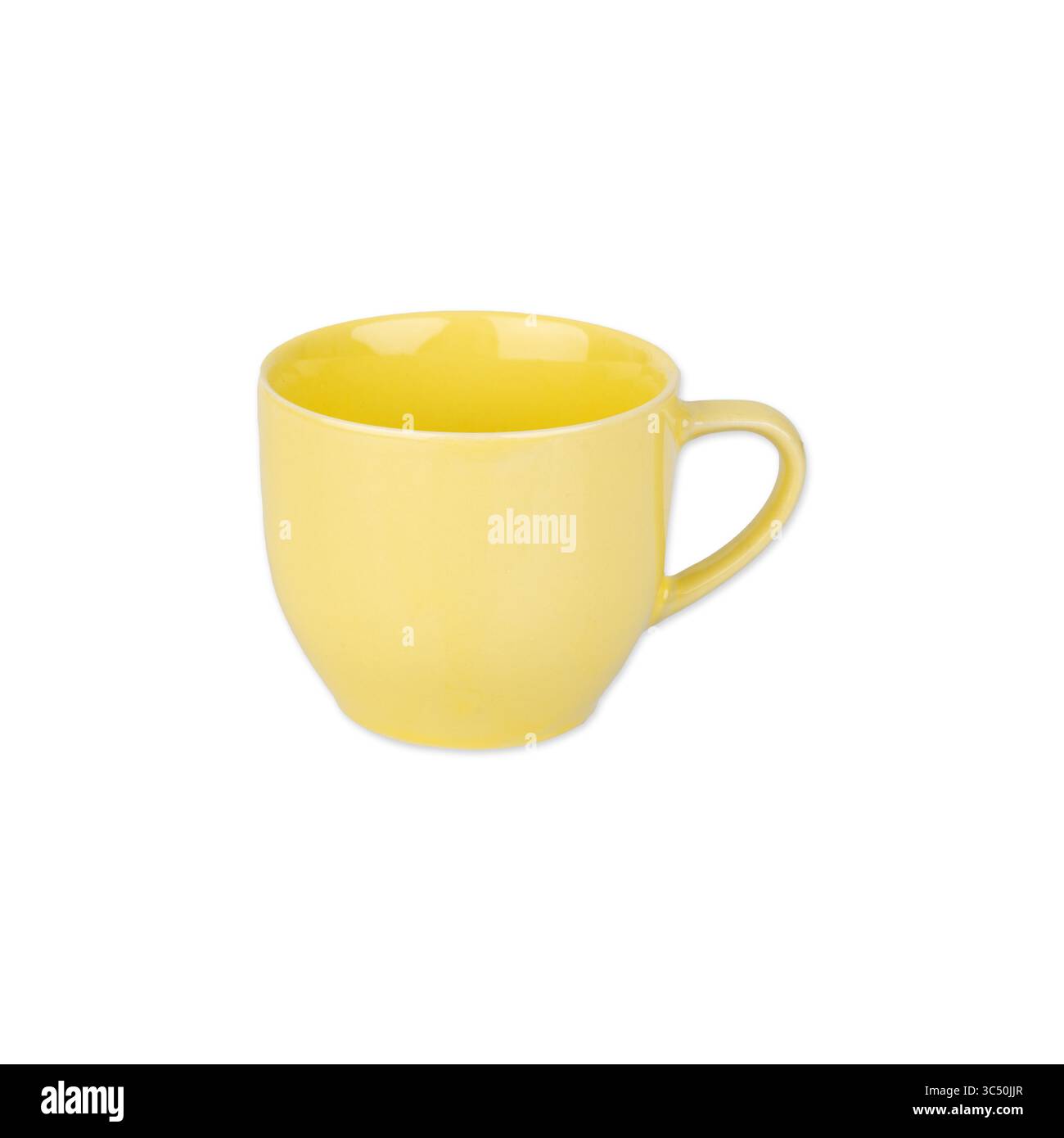 Yellow ceramic coffee cup isolated over white background. Stock Photo