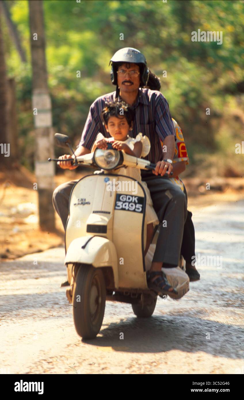 Family riding scooter moped hi res stock photography and images Alamy