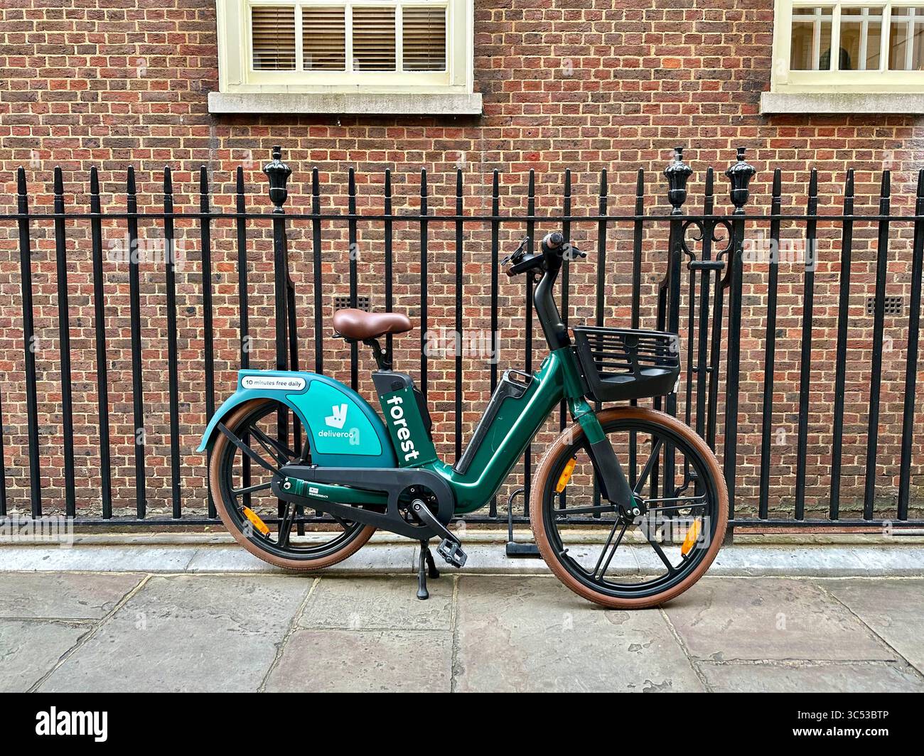 A forest bike on a sidewalk in London - Smartphone Captured Stock Image