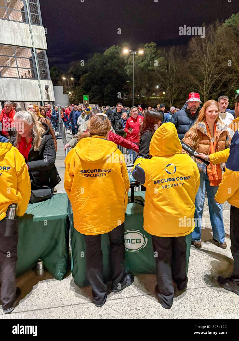 Melbourne Cricket Ground, bag check security point as fans arrive for British and Irish lions 2025 rugby test against Australia - Smartphone Captured Stock Image