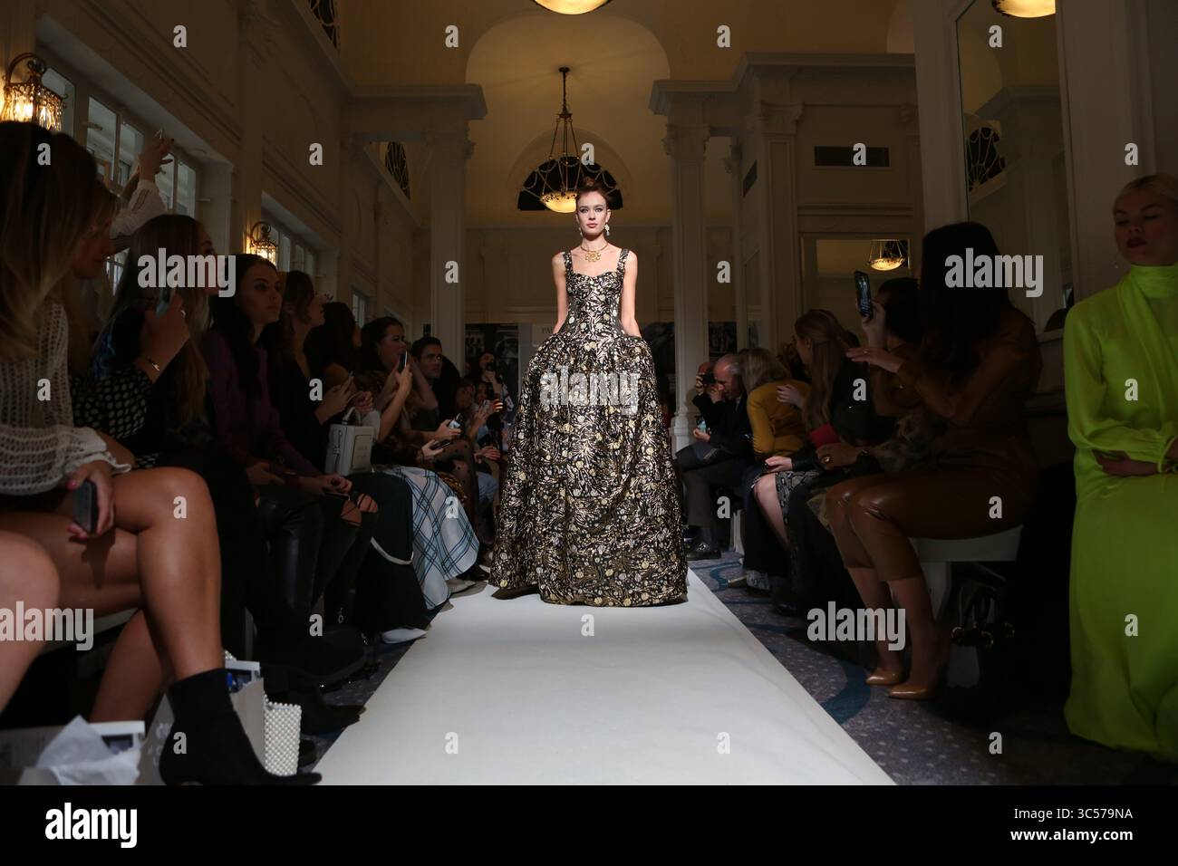February 18, 2019, London, United Kingdom: A model showcases at the Paul Costelloe show, Runway, Fall Winter 2019 during London Fashion Week at Simpsons the strand. (Credit Image: © Pietro Recchia/SOPA Images via ZUMA Wire) Stock Photo