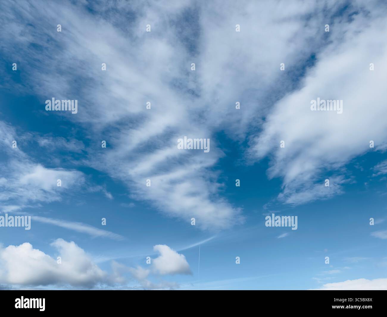 Stunning blue sky filled with puffy white clouds in a serene scene ...