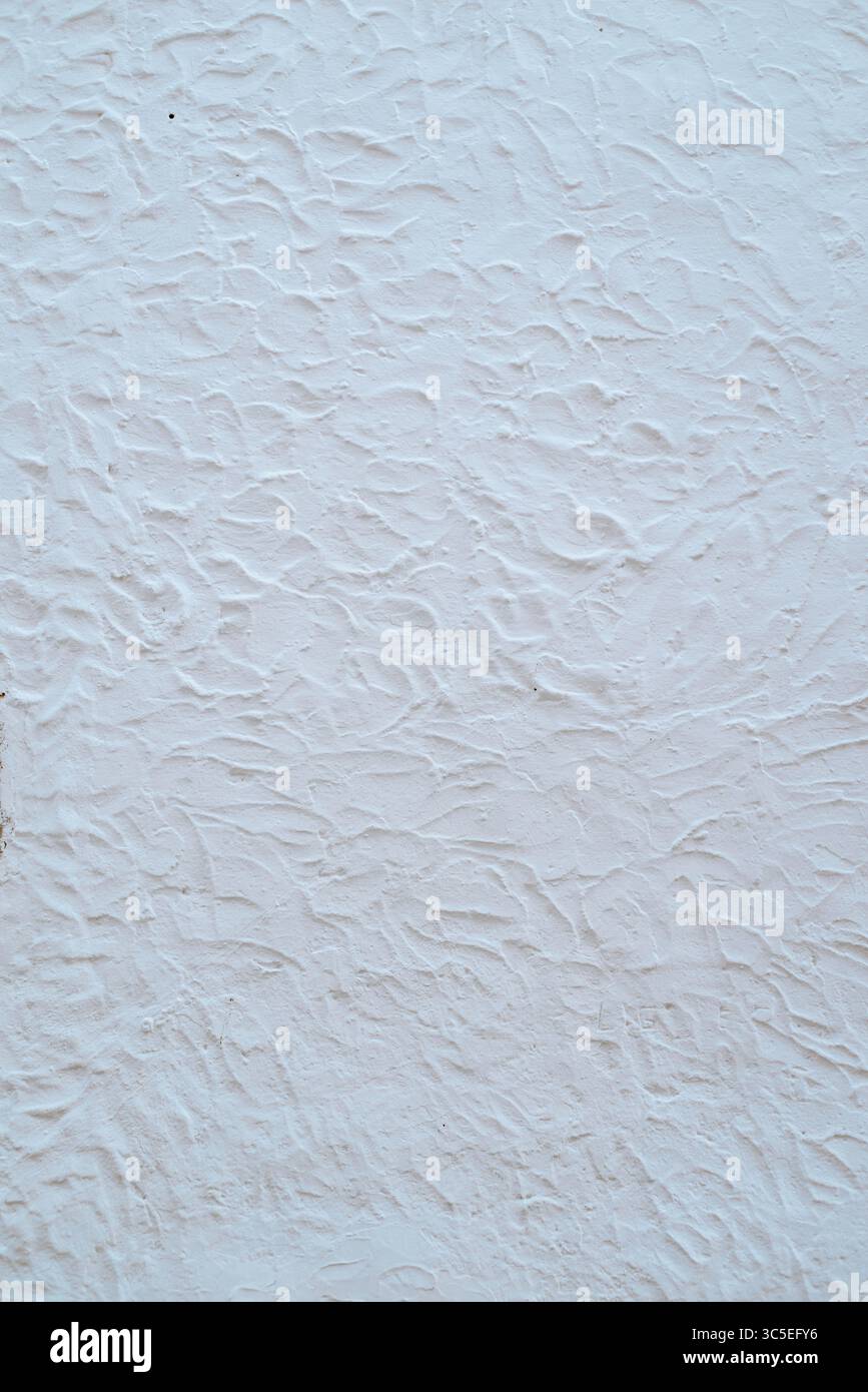 White rough stucco wall background texture Stock Photo