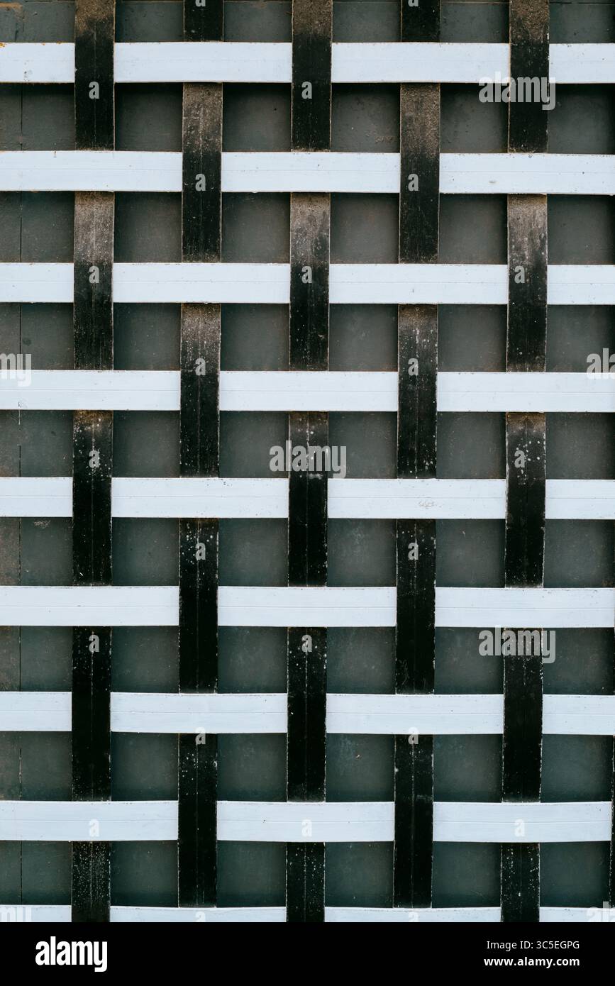 Woven metal pattern in black and white Stock Photo