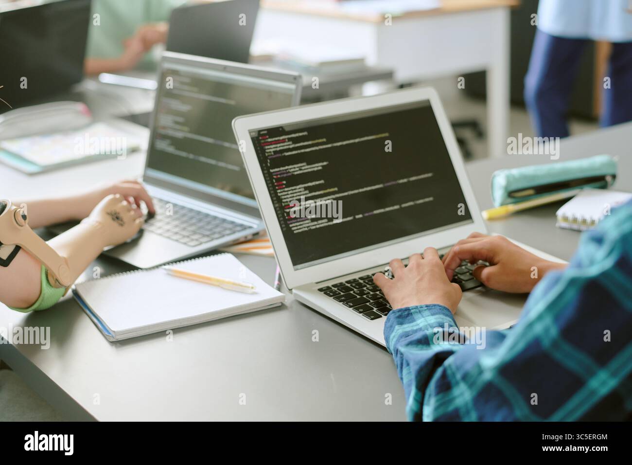 Kid Team Collaborating on Software Development Project Stock Photo