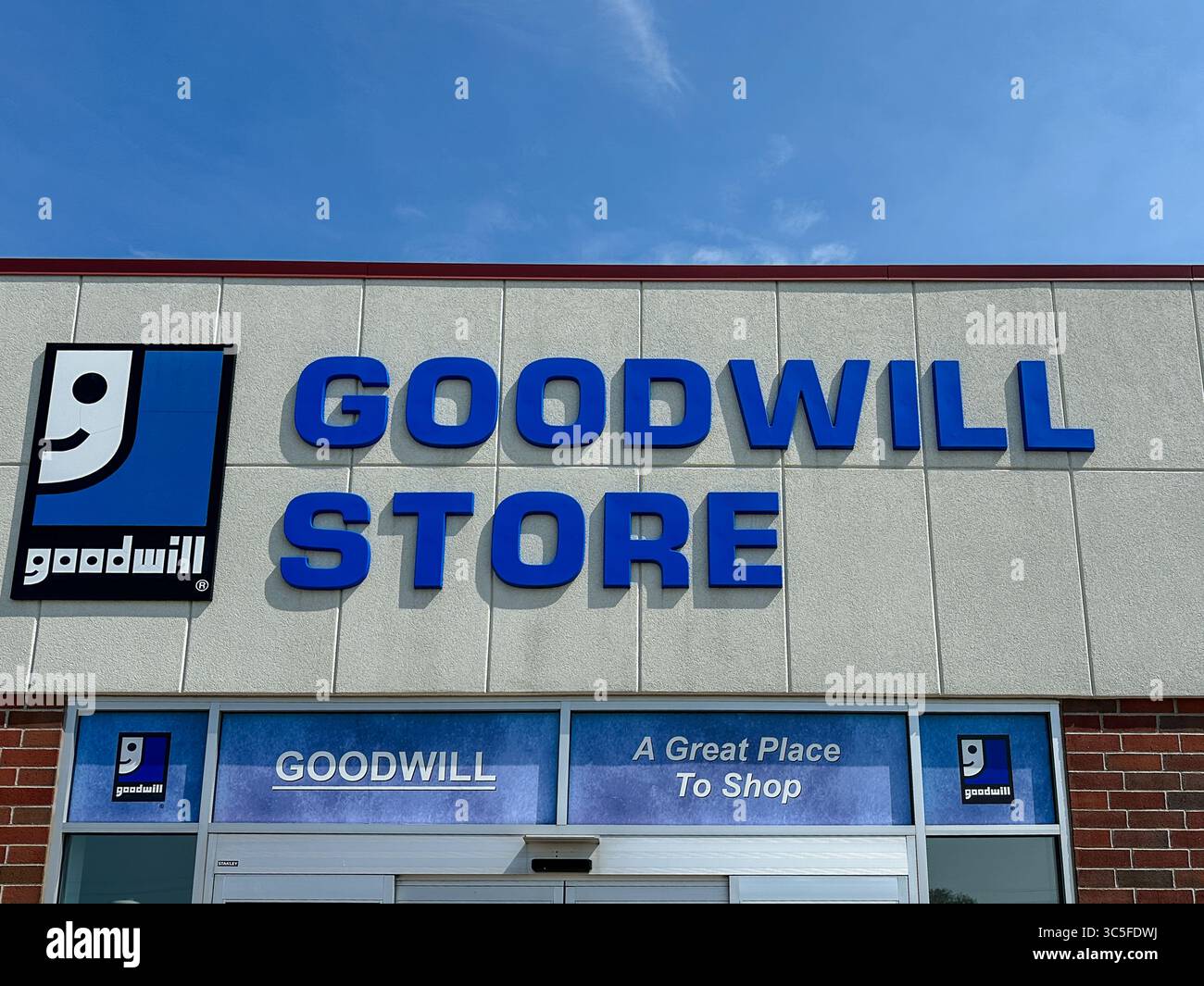 Goodwill store sign on the exterior of a building - Smartphone Captured Stock Image