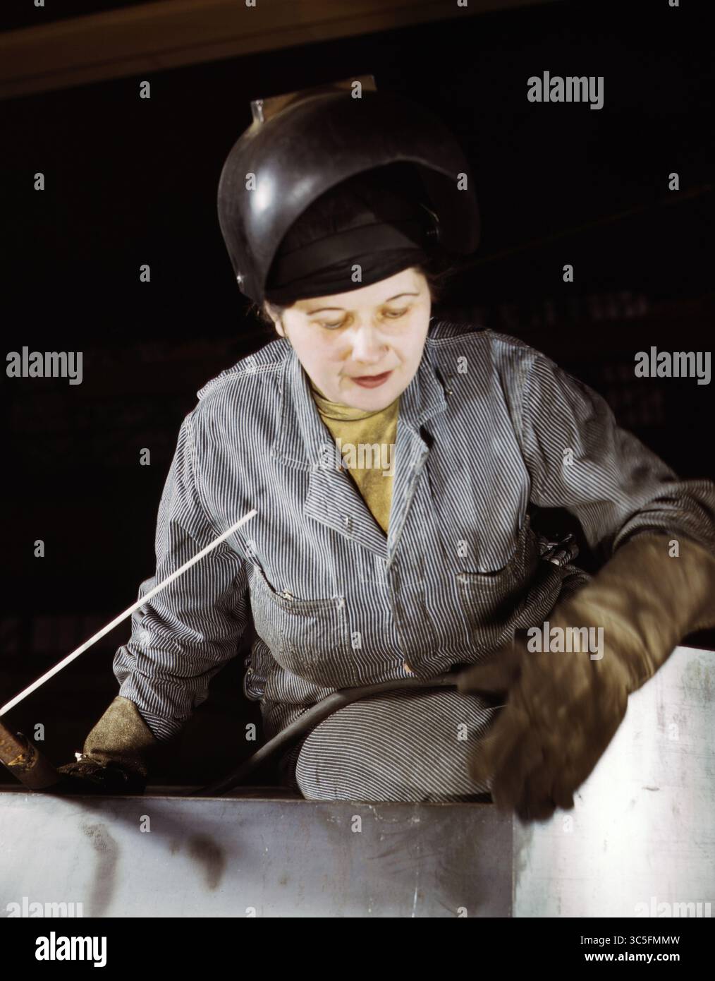 January 27, 2020, Milwaukee, Wisconsin, USA: Enola O'Connell, age 32, Widow and Mother of One Child, ex-housewife, now only Woman Welder at Heil and Co., Milwaukee, Wisconsin, USA, photograph by Howard R. Hollem, U.S. Office of War Information, February 1943 (Credit Image: © JT Vintage/Glasshouse via ZUMA Wire) Stock Photo