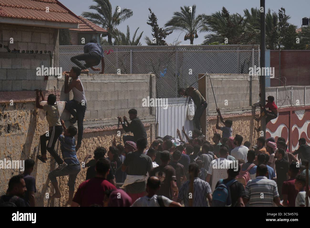 Palestinians Rush To Collect Humanitarian Aid Airdropped Into Zawaida Palestinians Rush To Collect Humanitarian Aid Airdropped Into Zawaida In Central Gaza Strip Wednesday July 30 2025 Ap Photoabdel Kareem Hana 3C5H57G