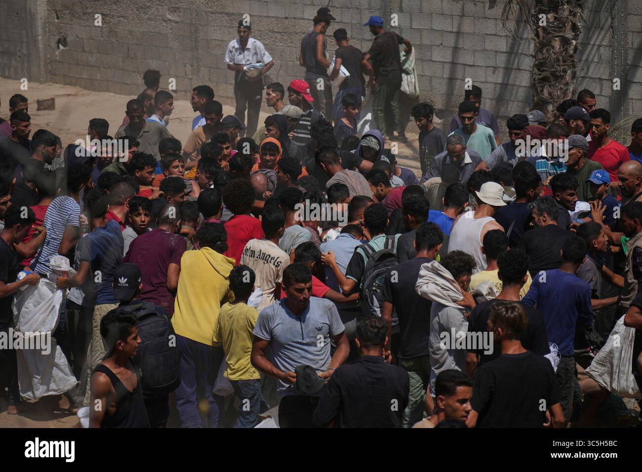 Palestinians Rush To Collect Humanitarian Aid Airdropped Into Zawaida Palestinians Rush To Collect Humanitarian Aid Airdropped Into Zawaida In Central Gaza Strip Wednesday July 30 2025 Ap Photoabdel Kareem Hana 3C5H5BC
