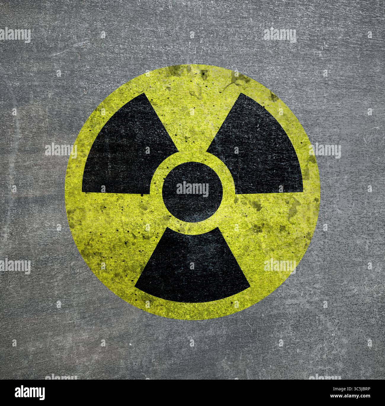Radioactive sign on grey textured surface. Radiological pollution Stock Photo