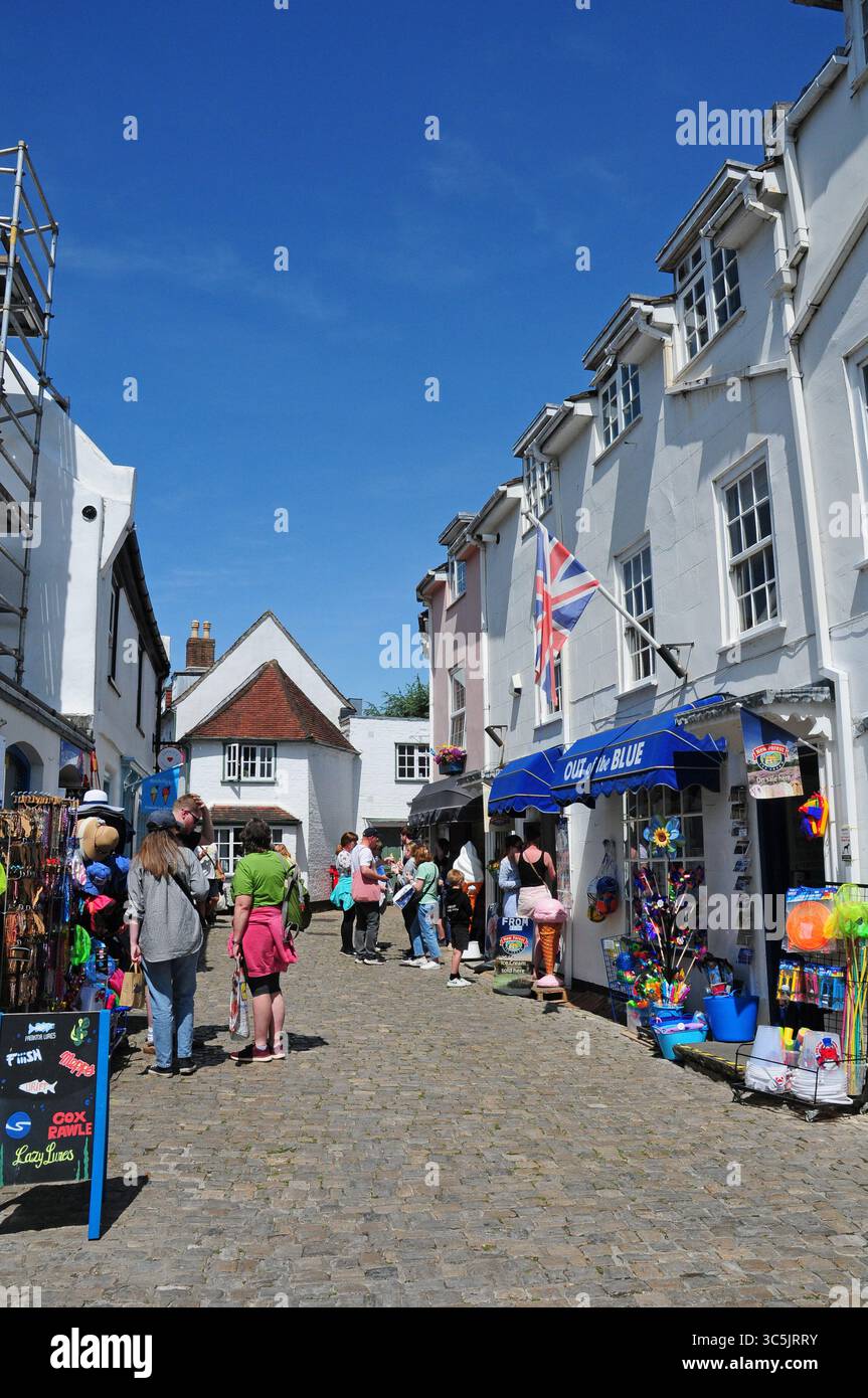 Cobbled street leading down to Lymington Quay. Stock Photo