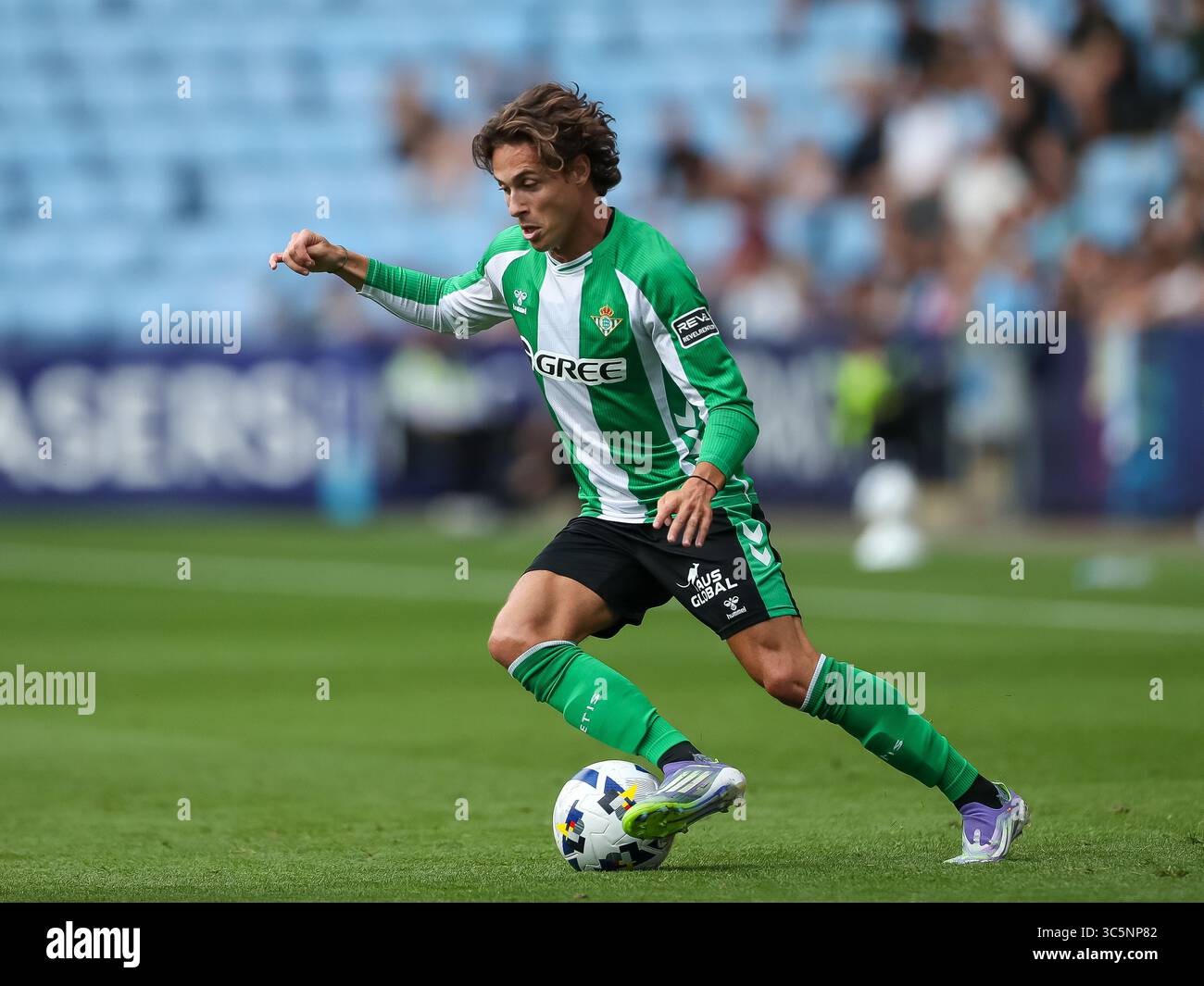 Coventry, UK. 30th July 2025. Rodrigo Riquelme of Real Betis dribbles ...