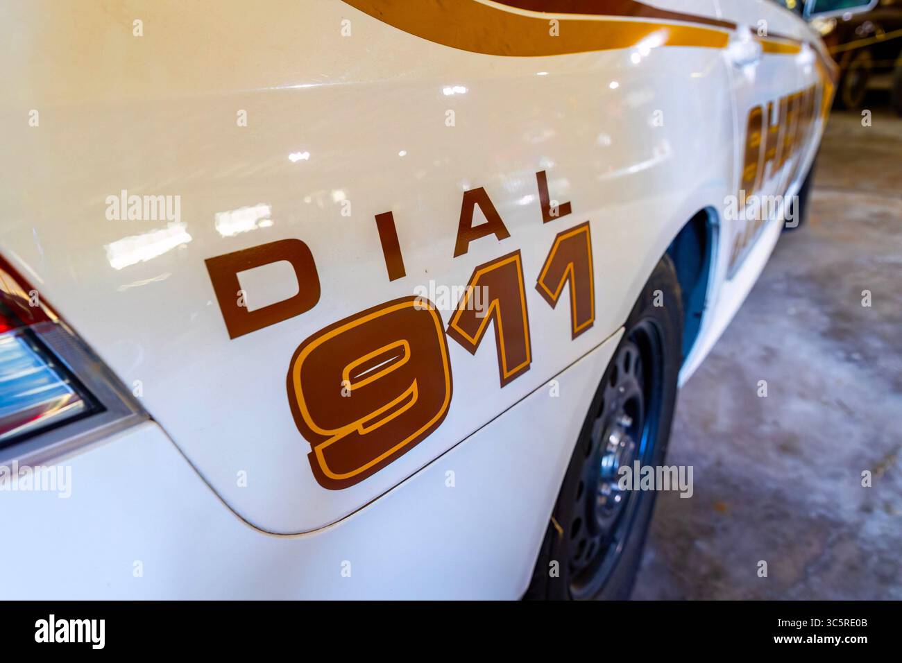 A close-up image captures the prominent 911 emergency logo on the side ...