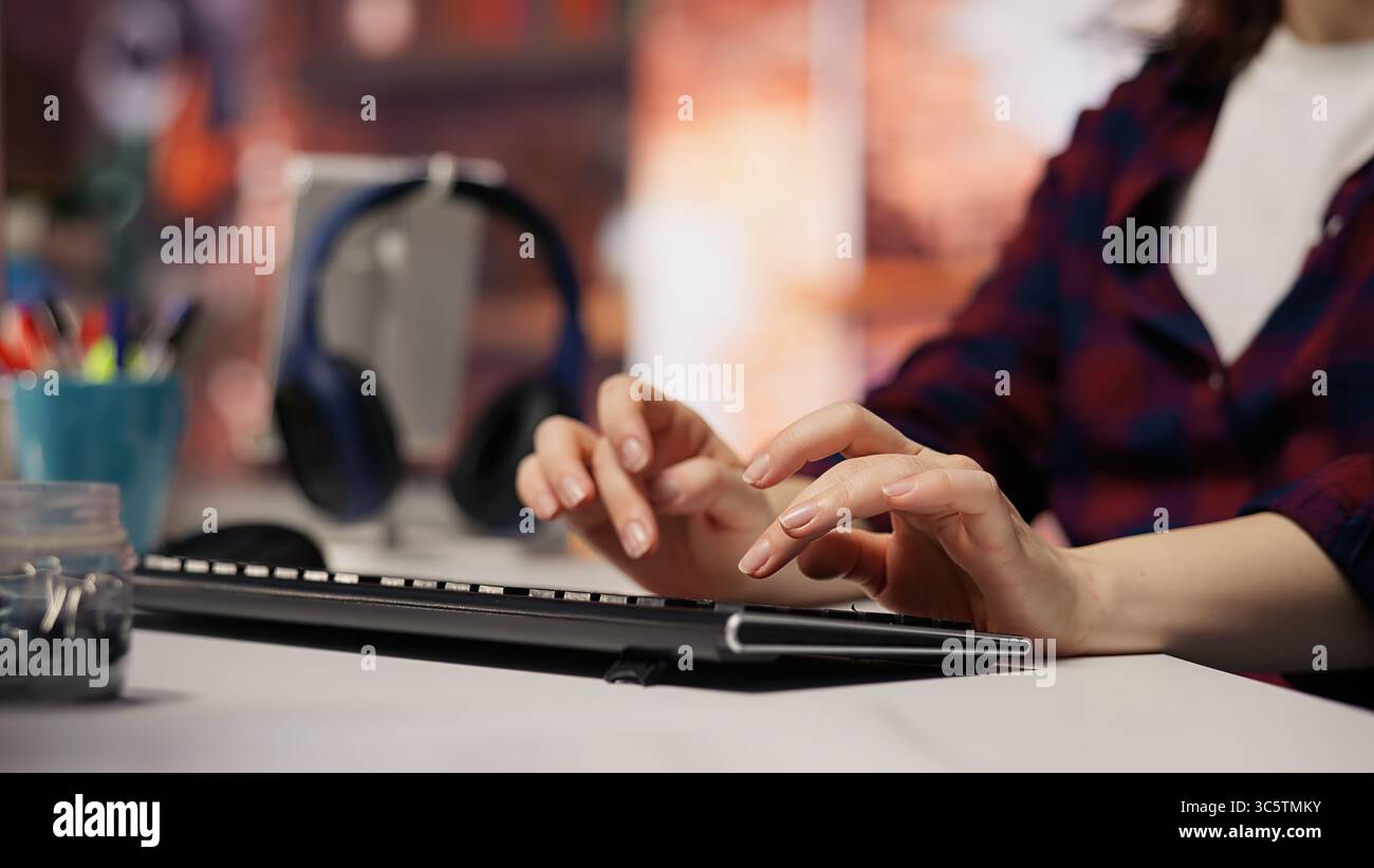 Startup engineer conducting detailed code review to fix bugs, identifying potential performance and technical issues with company software. IT worker debugging and optimizing code, camera B closeup Stock Photo