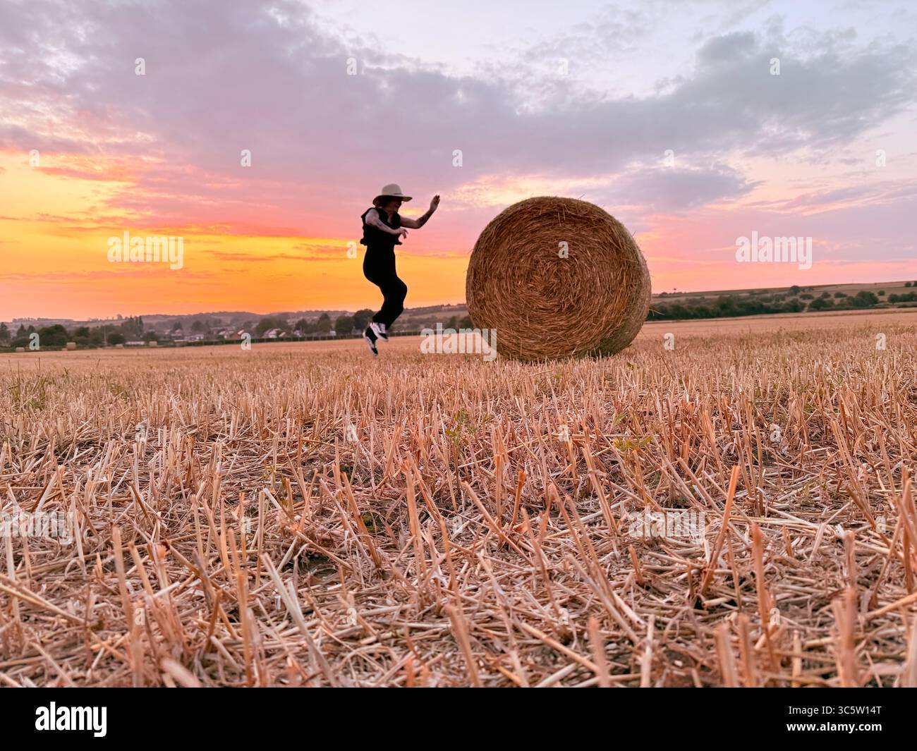 Moments of game with the bale of straw - Smartphone Captured Stock Image